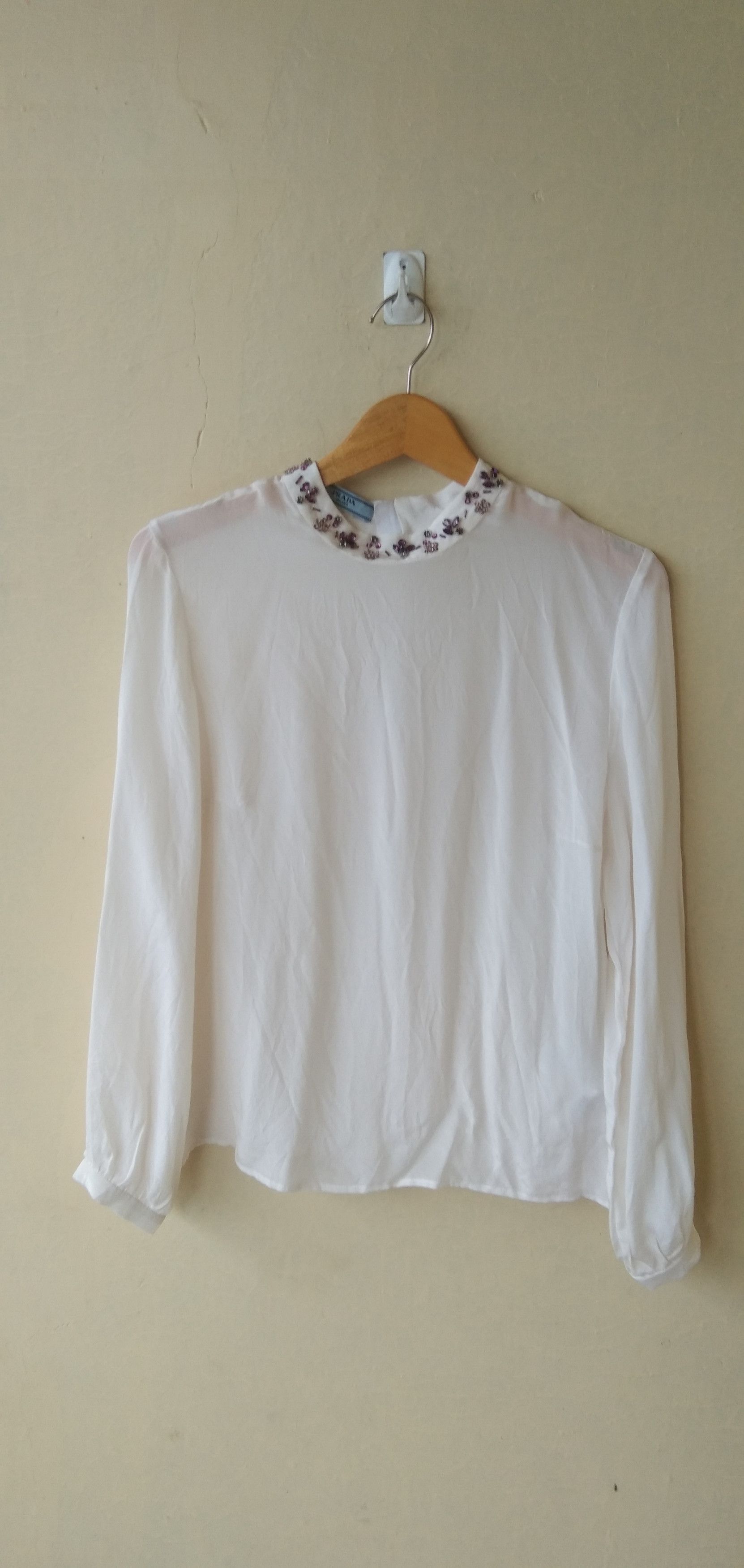 Prada tops broken white in the blouse