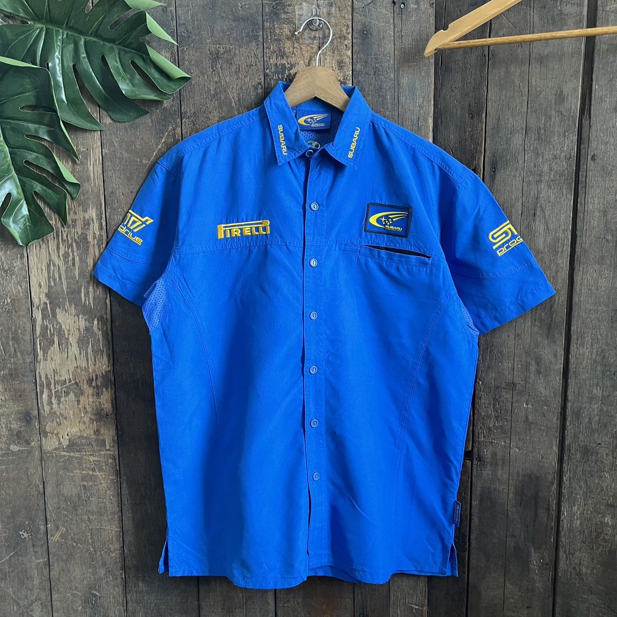 image of Subaru Sti World Rally Team Racing Shirt in Blue, Men's (Size Medium)