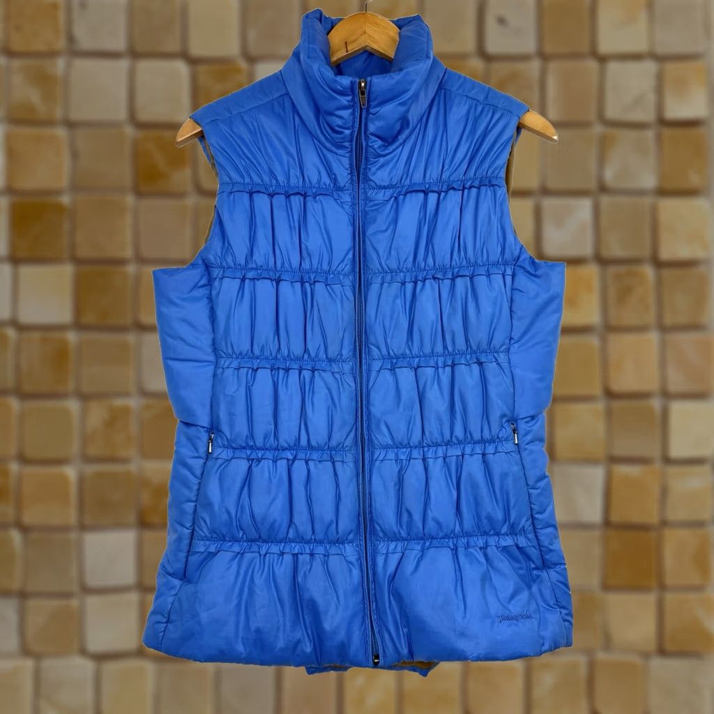 Patagonia Patagonia Lidia Vest Womens Large Blue Quilted Puff Insulated Packable Zipper Pockets Stand-Up Collar Mid-Length Sleeveless Casual Outdoor Travel Size L / US 10 / IT 46 - 1 Thumbnail