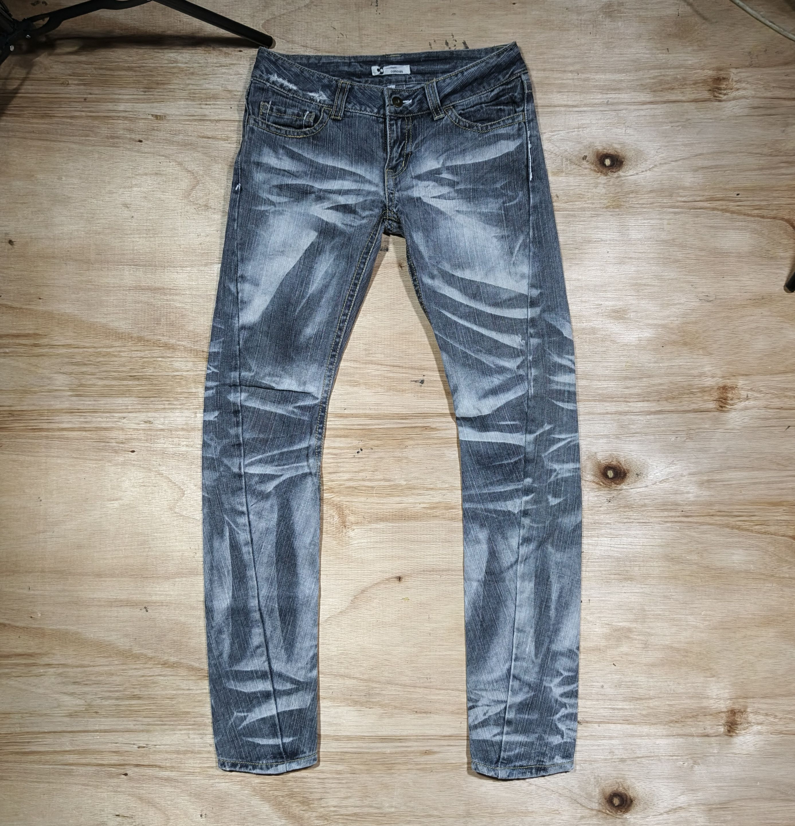 Y2K Osmosis Distressed Wash Twist Leg Jeans