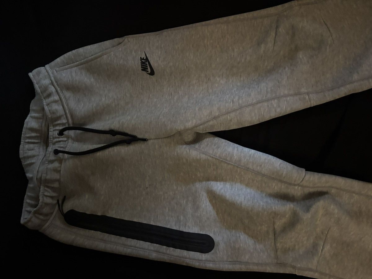 Grey nike tech pants