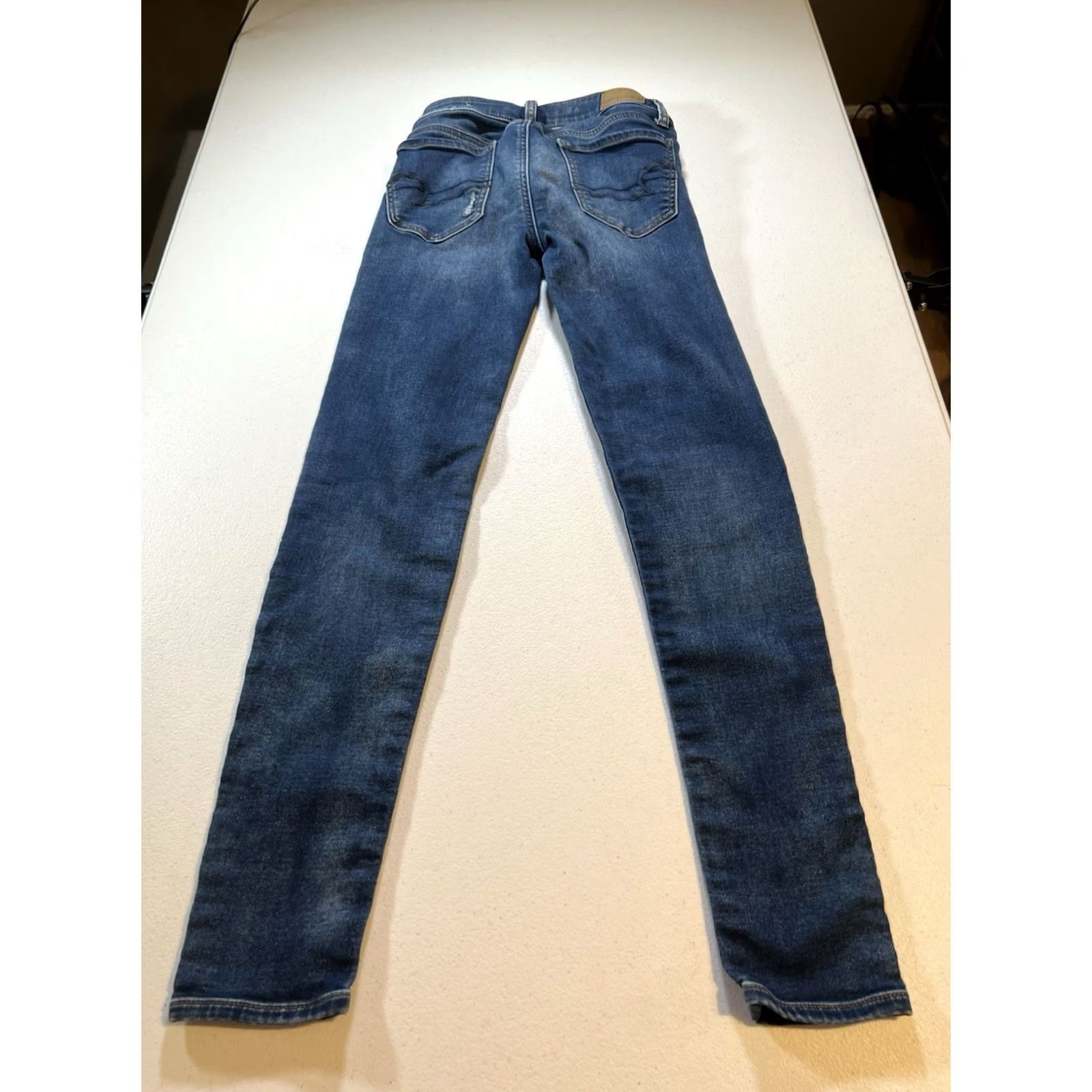 American Eagle Outfitters American Eagle Outfitters Jegging Womens 00 Blue Denim Distressed Button Mid Rise 26.5in Inseam Regular Stretch Comfort Pockets Medium Wash Size 24" / US 00 / IT 34 - 7 Thumbnail