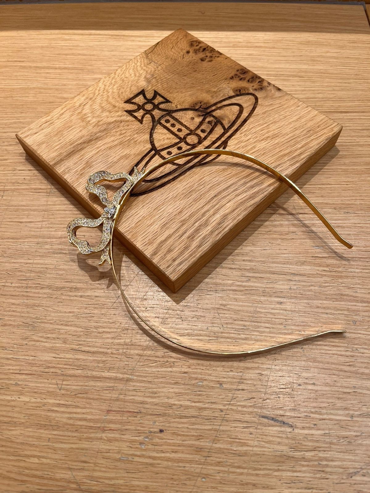 Vivienne Westwood o1f1d3z0525 Size: OS / Bow Alice Hair Band in Gold Size ONE SIZE - 1 Preview