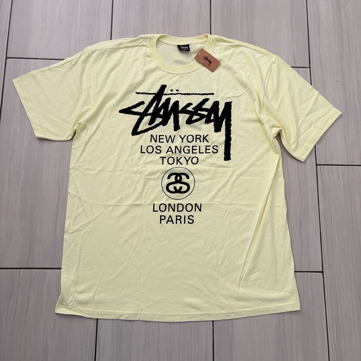 Stussy Stussy XL Pale Yellow World Tour Tee NWT Size US XL / EU 56 / 4 - 1 Thumbnail