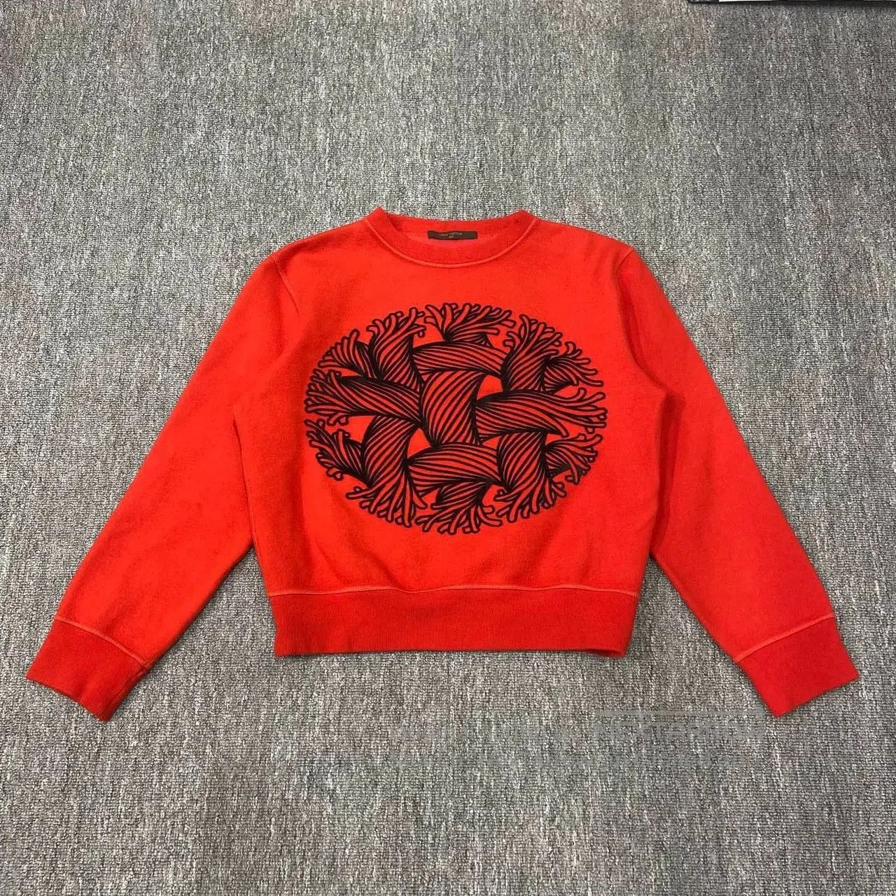 lv red limited edition knit sweatshirt.