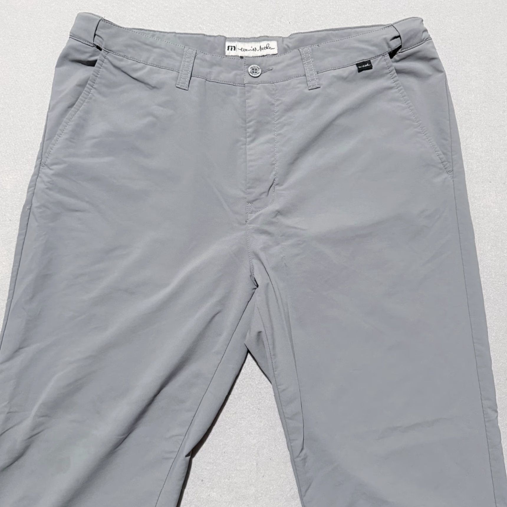 TravisMathew TravisMathew Golf Pants Men Gray 36 Stretch - 36 Chino, Flat Front, Regular, Inseam 27, Logo, Buttons Zip, Solid, Casual Accessories Size US 36 / EU 52 - 3 Thumbnail