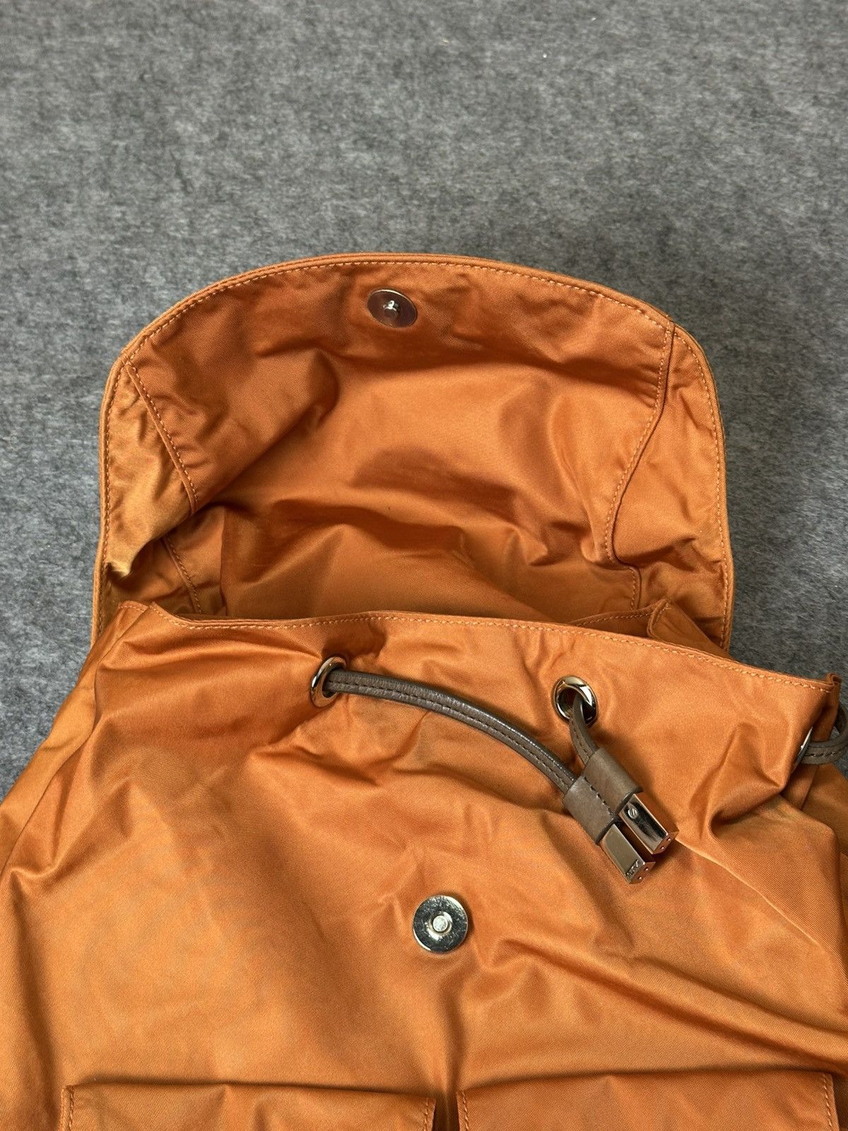 Tumi Tumi Voyageur Basel Backpack in a burnt orange nylon. Size ONE SIZE - 16 Thumbnail