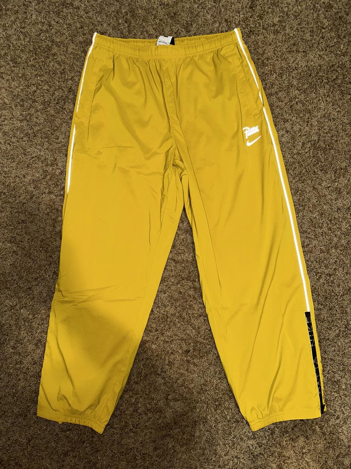Nike Nike Men’s Patta Running Team Saffron Quartz Tracksuit Bottoms Size US 34 / EU 50 - 1 Thumbnail
