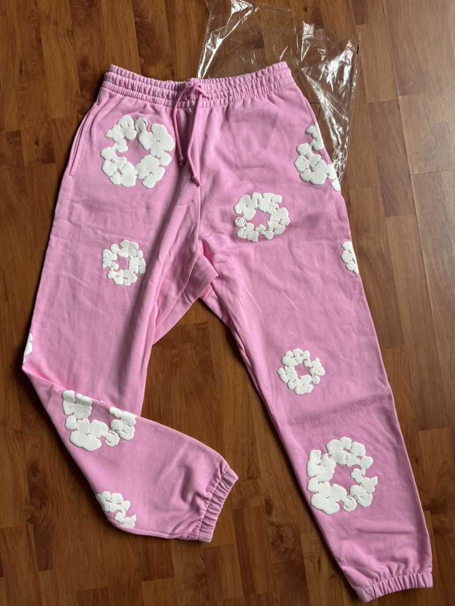 image of Denim Tears All Over Wreath Sweatpants Pink, Men's (Size 36)