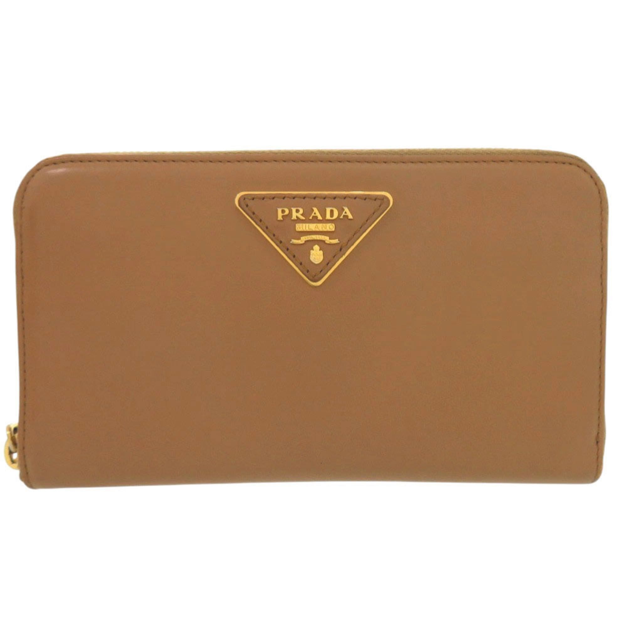 Prada Excellent condition Prada Triangle Logo Plate Round Zip Wallet 1M0506 Gold Hardware Leather Caramel Brown Long 0663PRADA Size ONE SIZE - 1 Thumbnail
