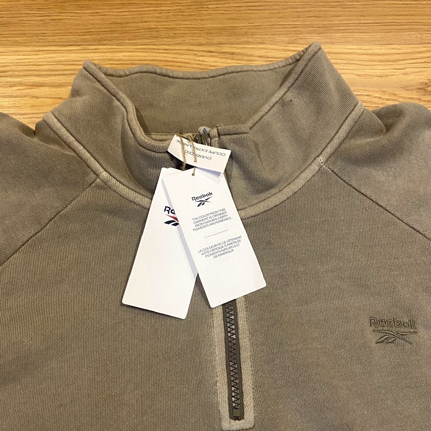 Reebok **NWT Reebok 2XL Men’s Brown 1/4 Zip Pullover Sweatshirt** User: NWT Reebok 2XL Men’s 1/4 Zip Brown Pullover Sweatshirt Size US XXL / EU 58 / 5 - 7 Thumbnail