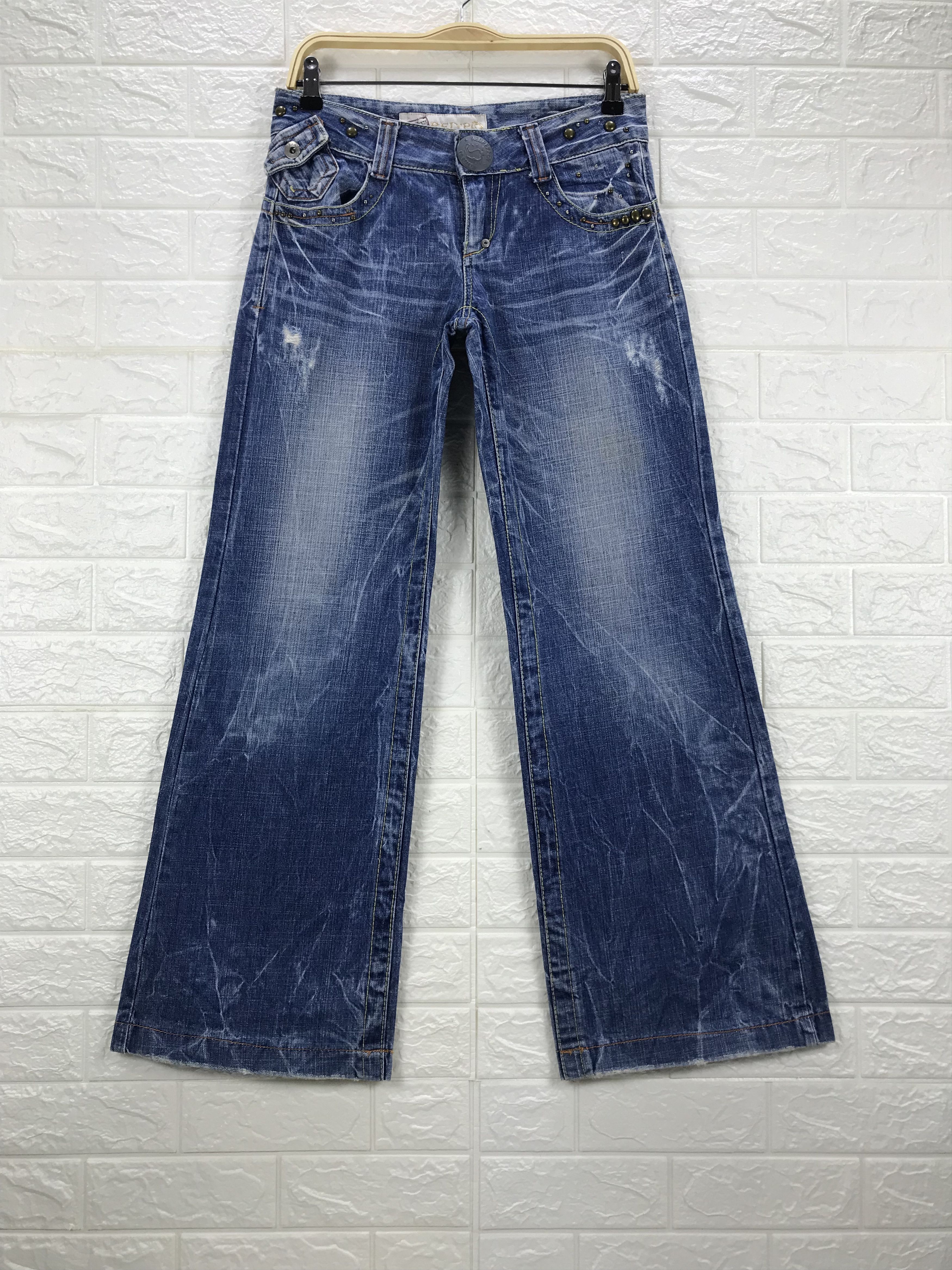 image of Avant Garde x Beauty Beast Super Flare Jeans Red Pepper Studded Cinch Bootcut Denim in Blue, Women'