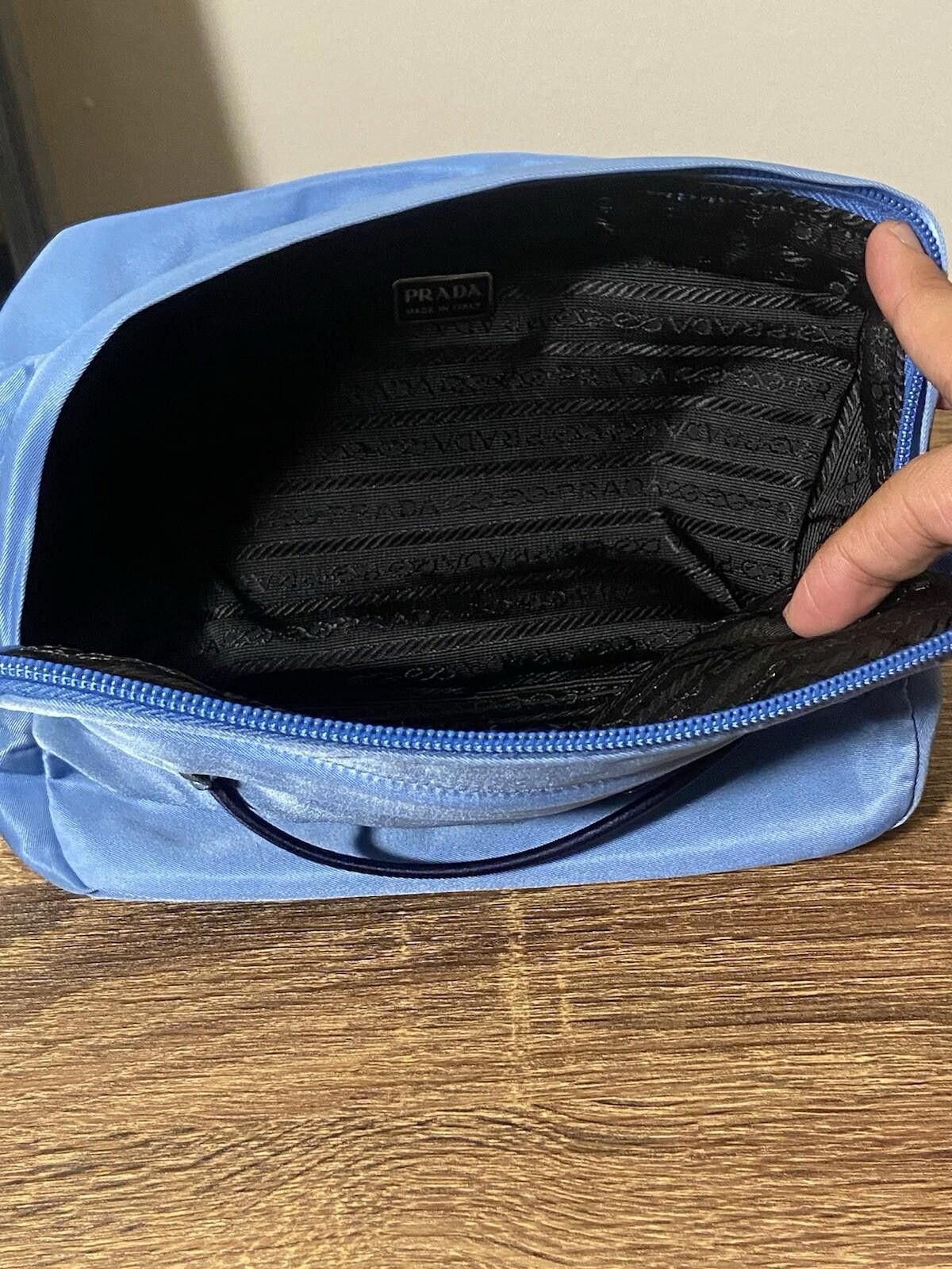 Prada Prada blue nylon logo-lined clutch pouch bag w strap, good* Size ONE SIZE - 8 Thumbnail