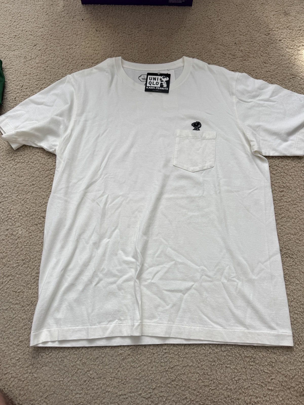 Kaws × Peanuts × Uniqlo Uniqlo x Kaws x Peanuts Snoopy Pocket Tee Size L new Size US L / EU 52-54 / 3 - 1 Thumbnail