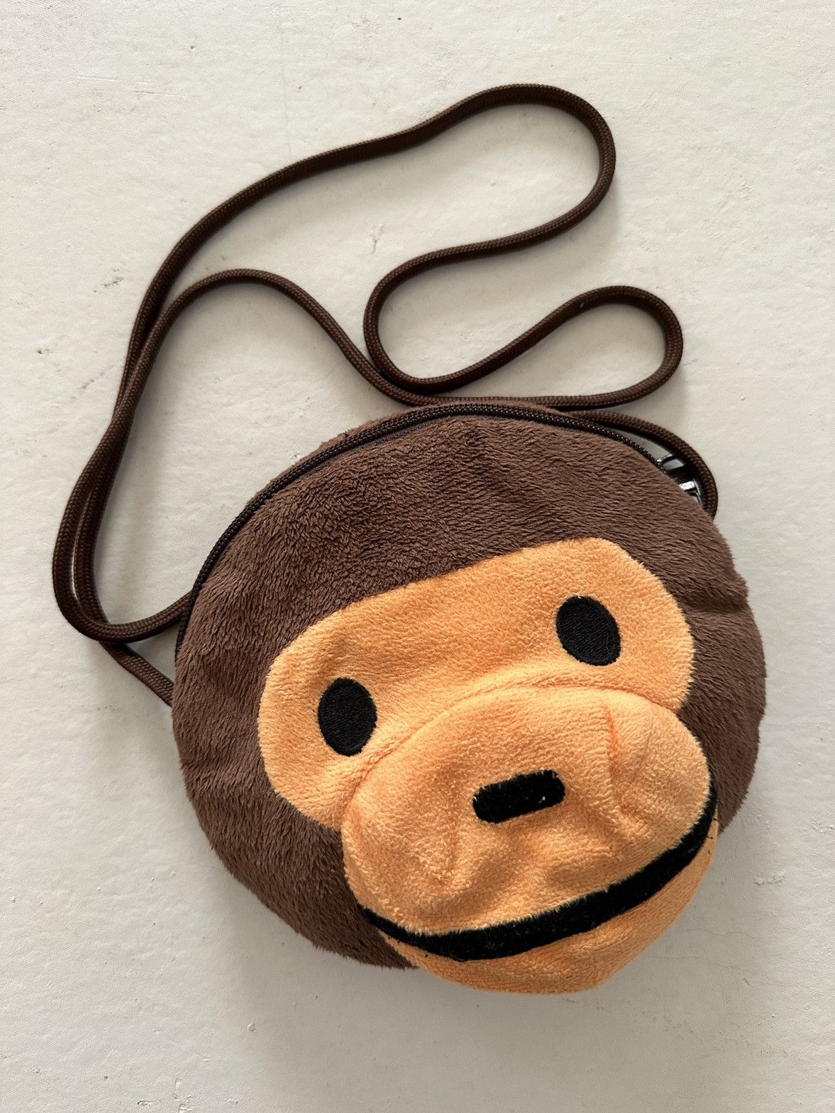Bape × CHOCOOLATE Bape Baby Milo Head Sling Bag Size ONE SIZE - 1 Thumbnail