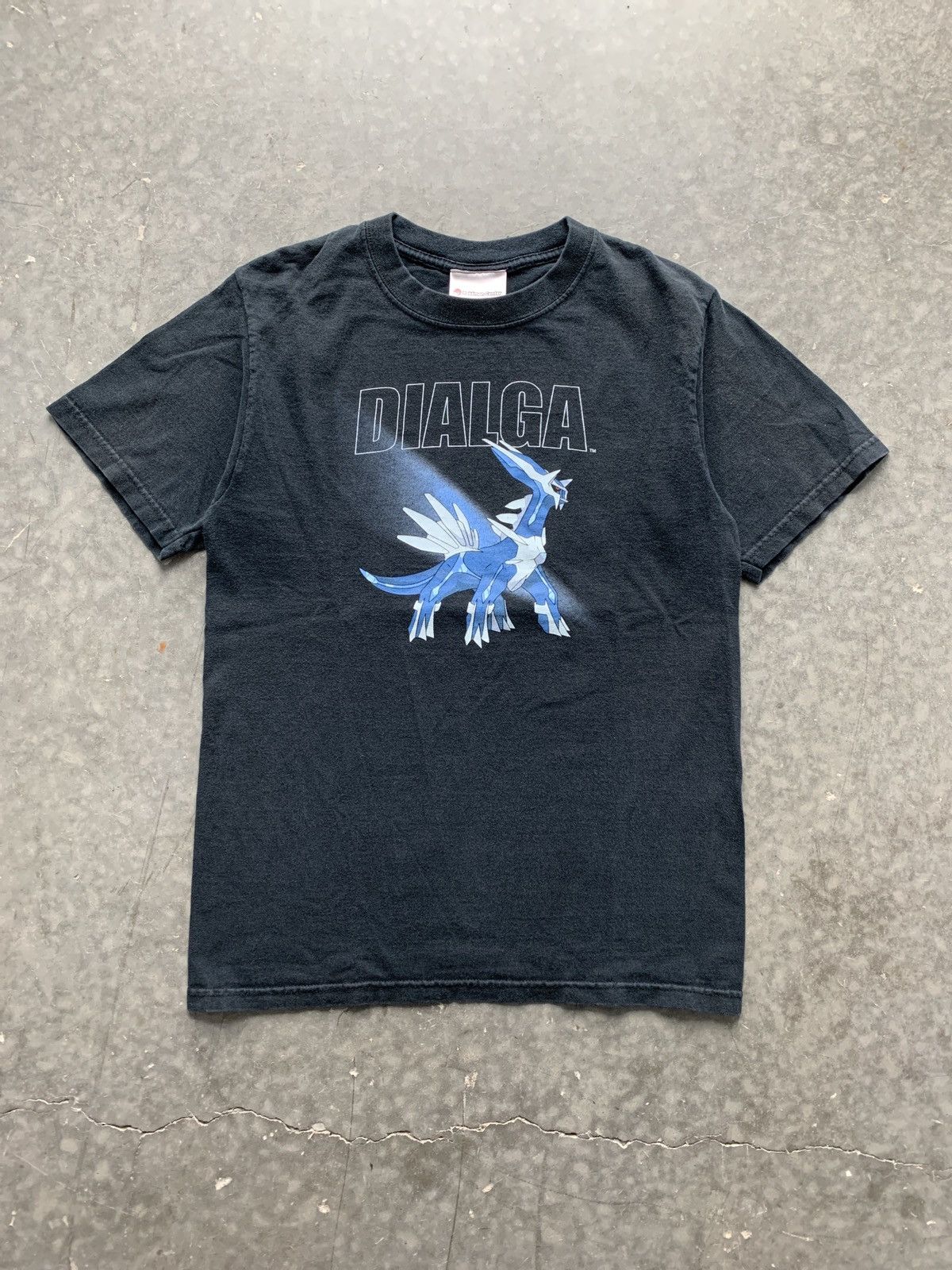 image of Nintendo x Pokemon Vintage Y2K Pokémon Dialga Graphic Tee in Black, Men's (Size Small)