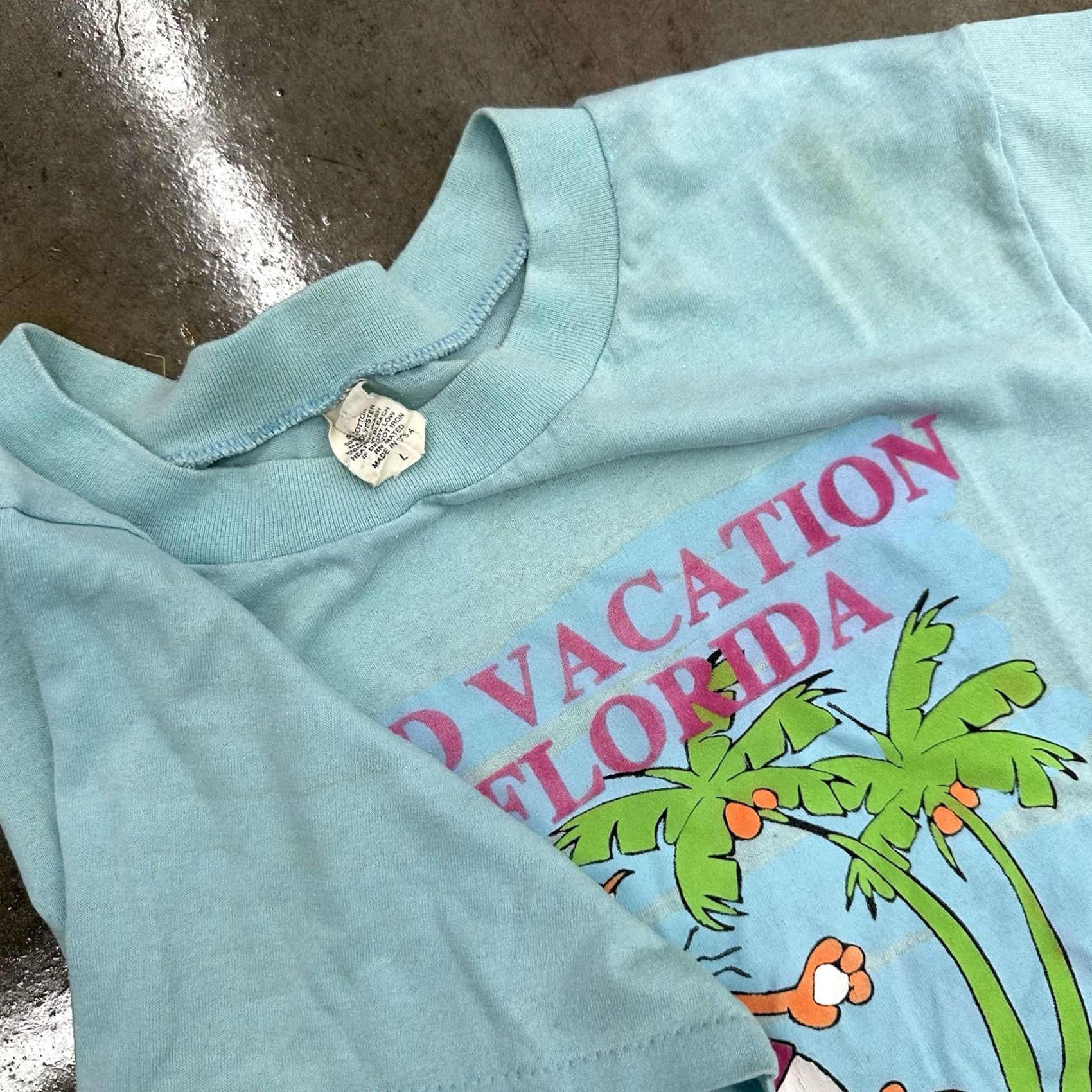 Vintage VINTAGE 80s A Bad Vacation In Florida Graphic T Shirt Blue Distressed Large Men Short Sleeve Crew Neck 1980s 80s Florida Shirt Size US L / EU 52-54 / 3 - 2 Thumbnail