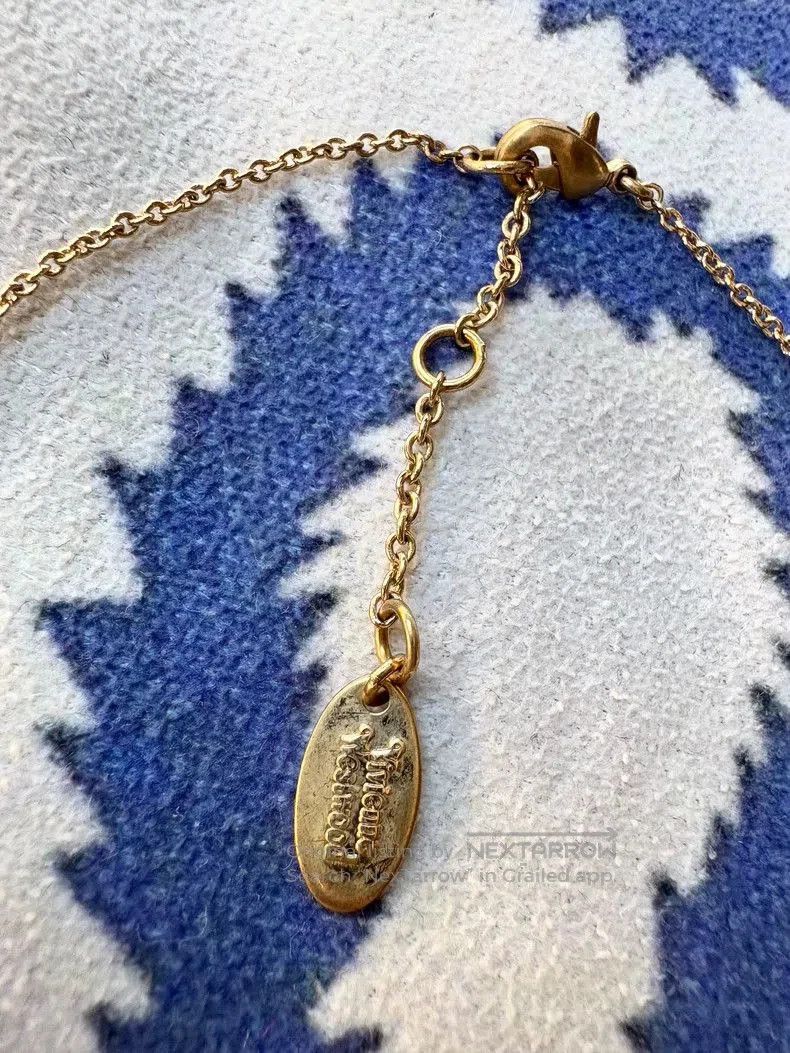 Vivienne Westwood Vivienne Westwood Mother of Pearl Saturn Necklace. Size ONE SIZE - 7 Thumbnail