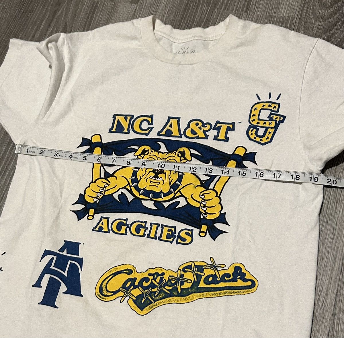 Mitchell & Ness × Travis Scott Mitchell & Ness x Cactus Jack North Carolina A&T college tee Size US M / EU 48-50 / 2 - 7 Thumbnail