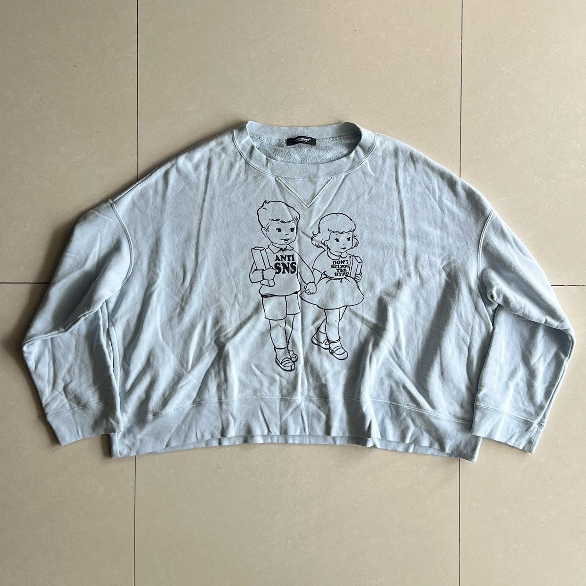 AW18 Undercover anti sns cropped sweater