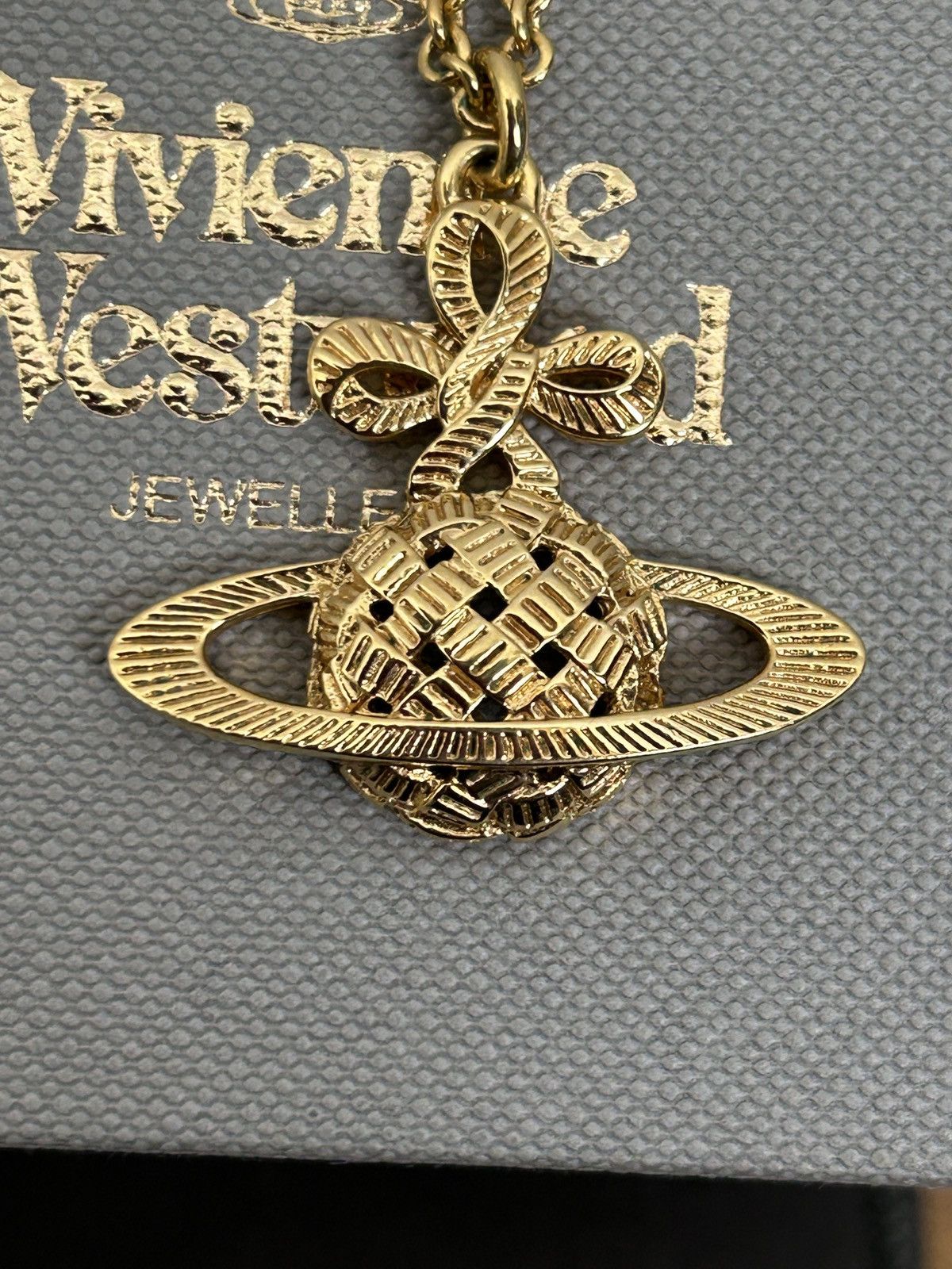 Vivienne Westwood Simone Orb Ribbon Bas Relief Necklace Gold