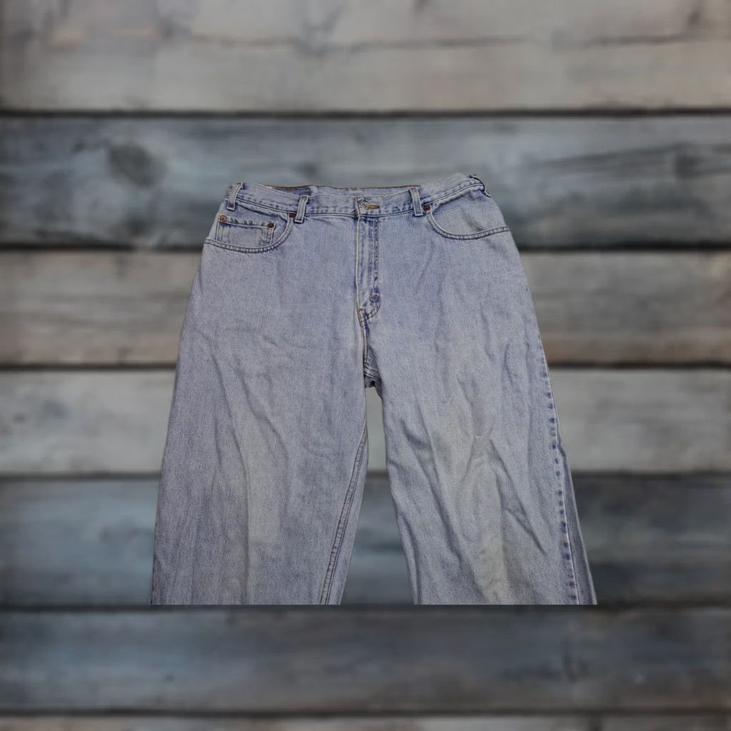 Levi's Vintage Levi's 560 Jeans Men 36x30 Blue Wide-Leg Hip Hop Distressed Light Wash 90s Mens Size US 36 / EU 52 - 1 Thumbnail