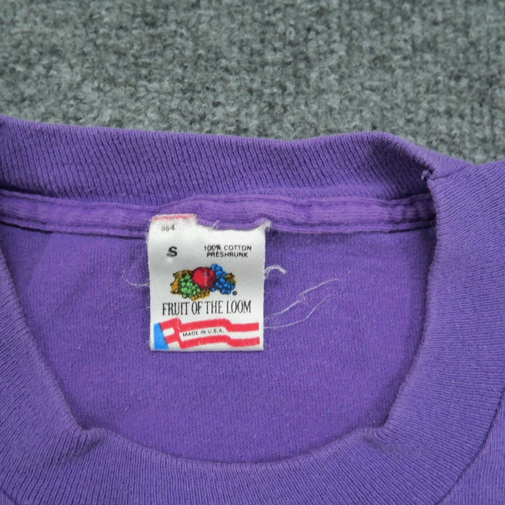 Fruit Of The Loom VINTAGE Fruit of the Loom T-Shirt Men Shirt 90s Purple White? (Note: need to not introduce new info) Size US S / EU 44-46 / 1 - 6 Thumbnail