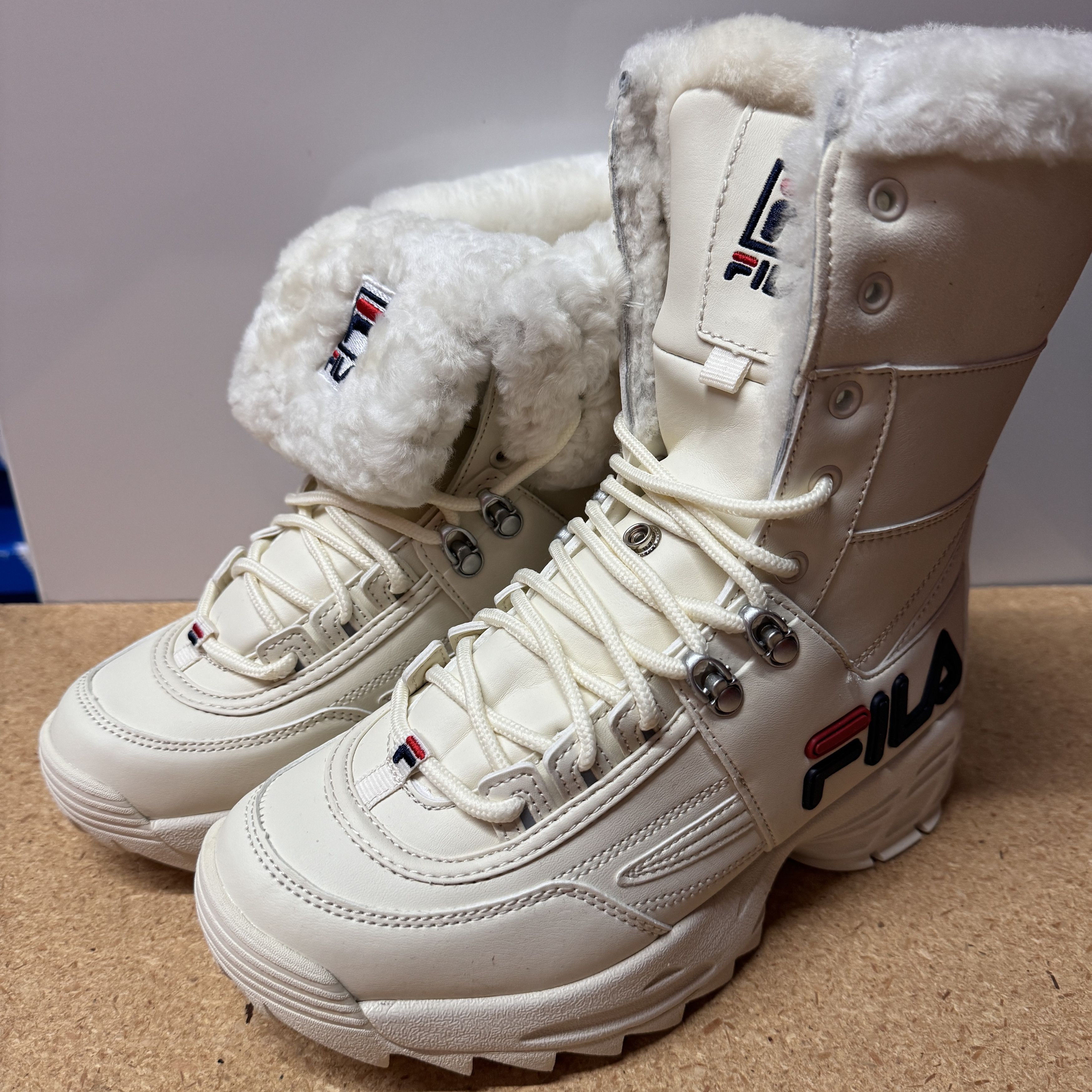 Fila white boots with fur online