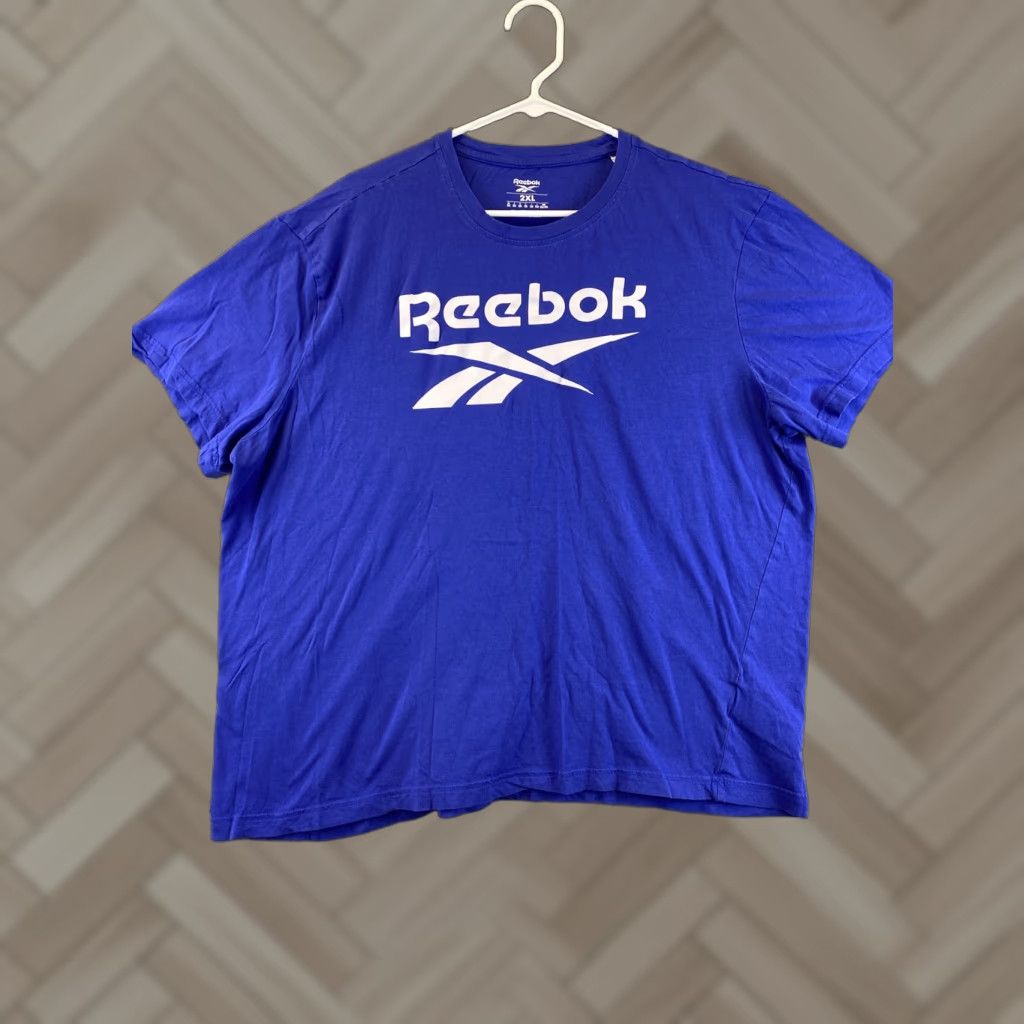 Reebok Reebok Women Top 2XL Blue Print Athletic Short Sleeve V-Neck 72-38 Size XXL / US 16-18 / IT 52-54 - 1 Thumbnail