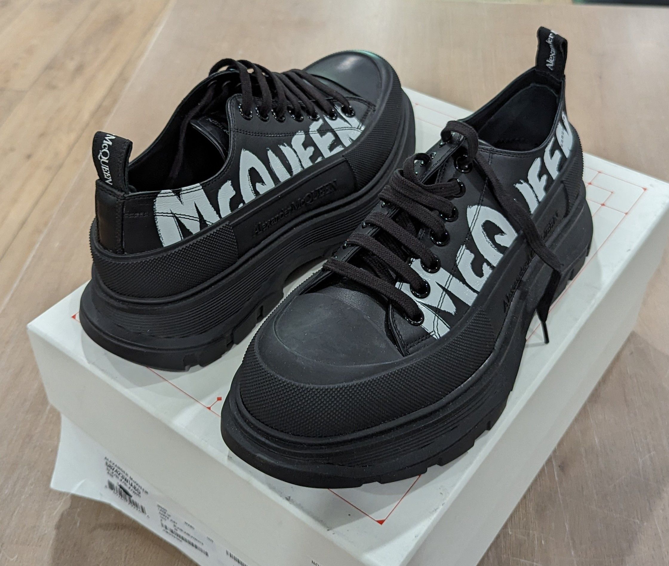 Alexander McQueen Alexander McQueen Slick Tread Graffiti Sneakers  Black/White | Grailed