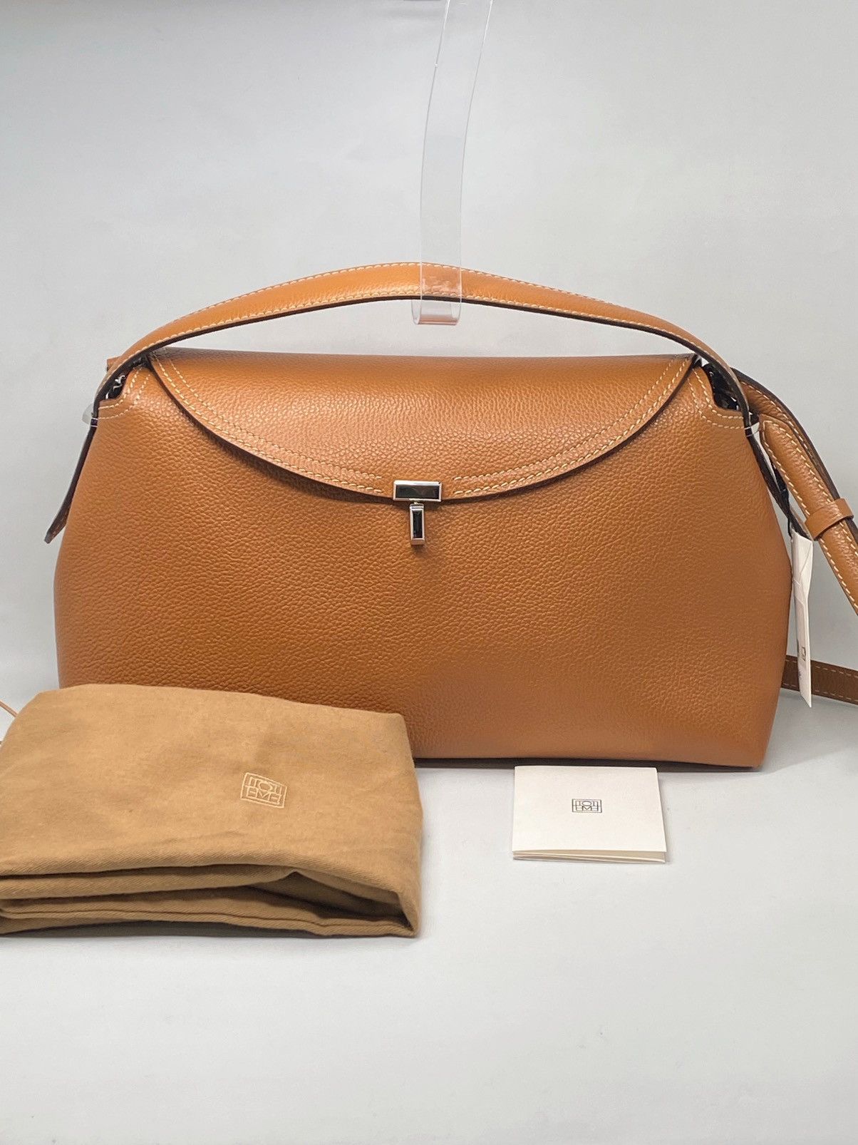 Toteme T-Lock Top Handle Bag In Pebble Grain Leather in Beige, Women's