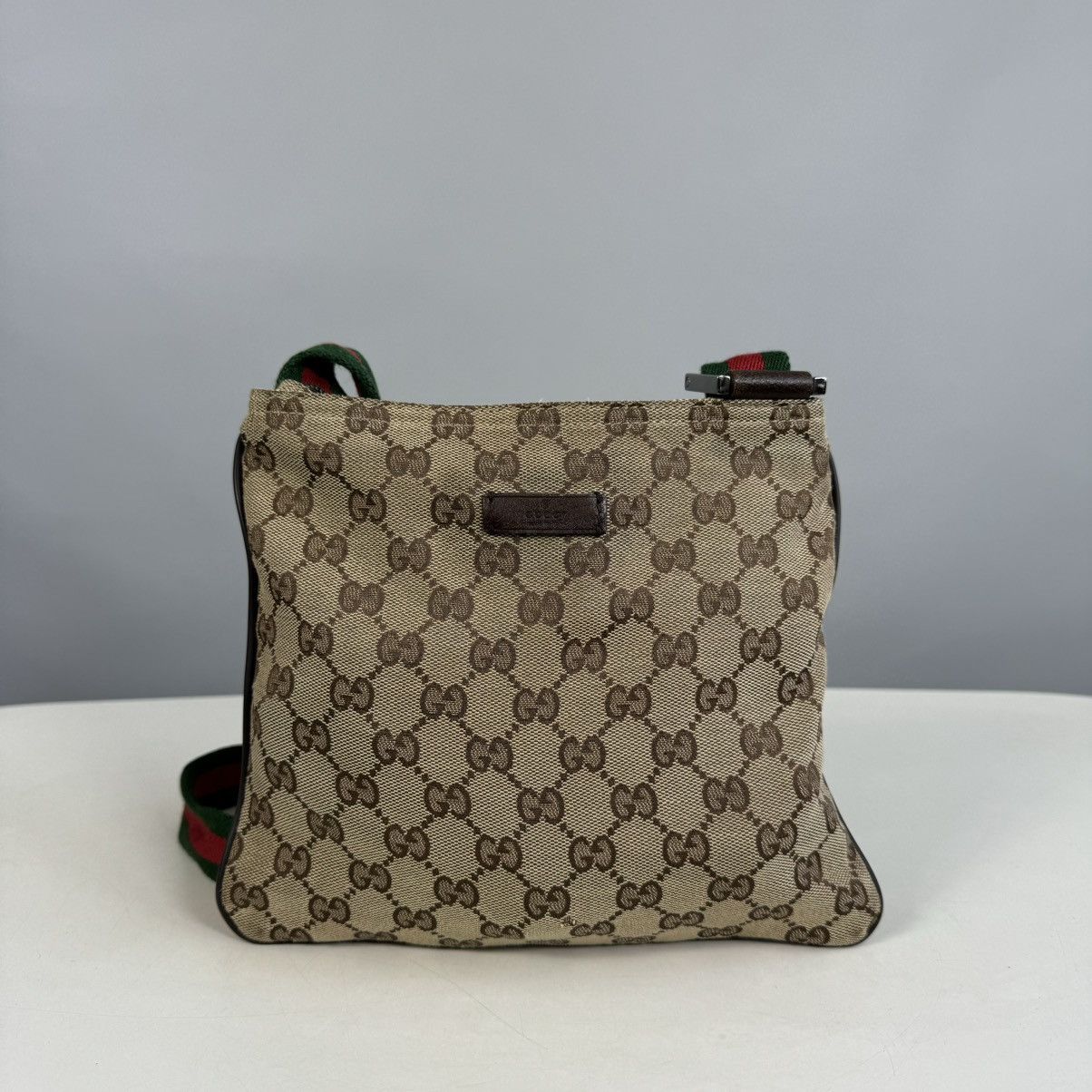image of Gucci Sherry GG Monogram Patern Crossbody in Brown, Men's