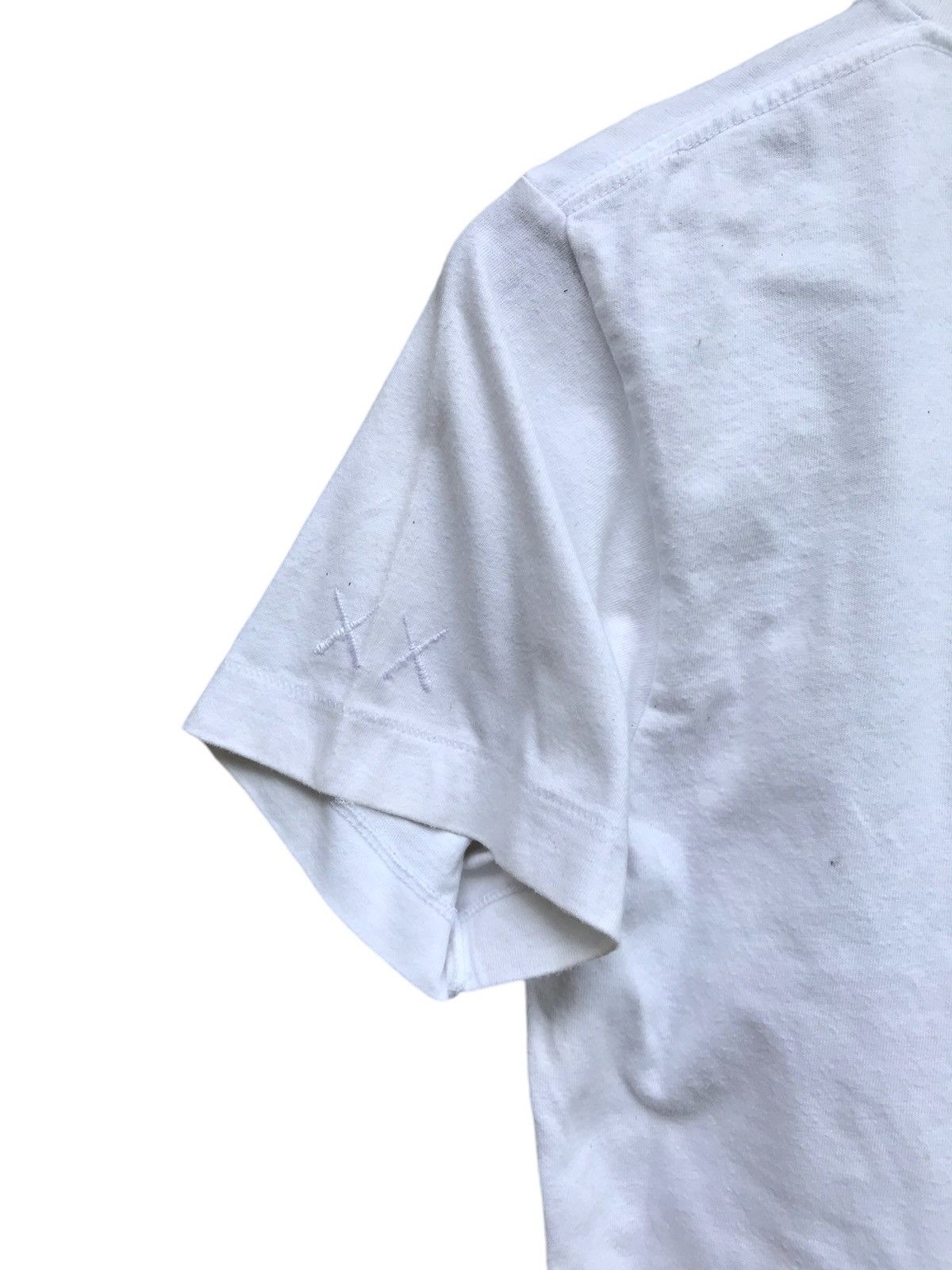 Kaws × Peanuts × Uniqlo KAWS X PEANUTS UNIQLO TEES Size US S / EU 44-46 / 1 - 5 Thumbnail
