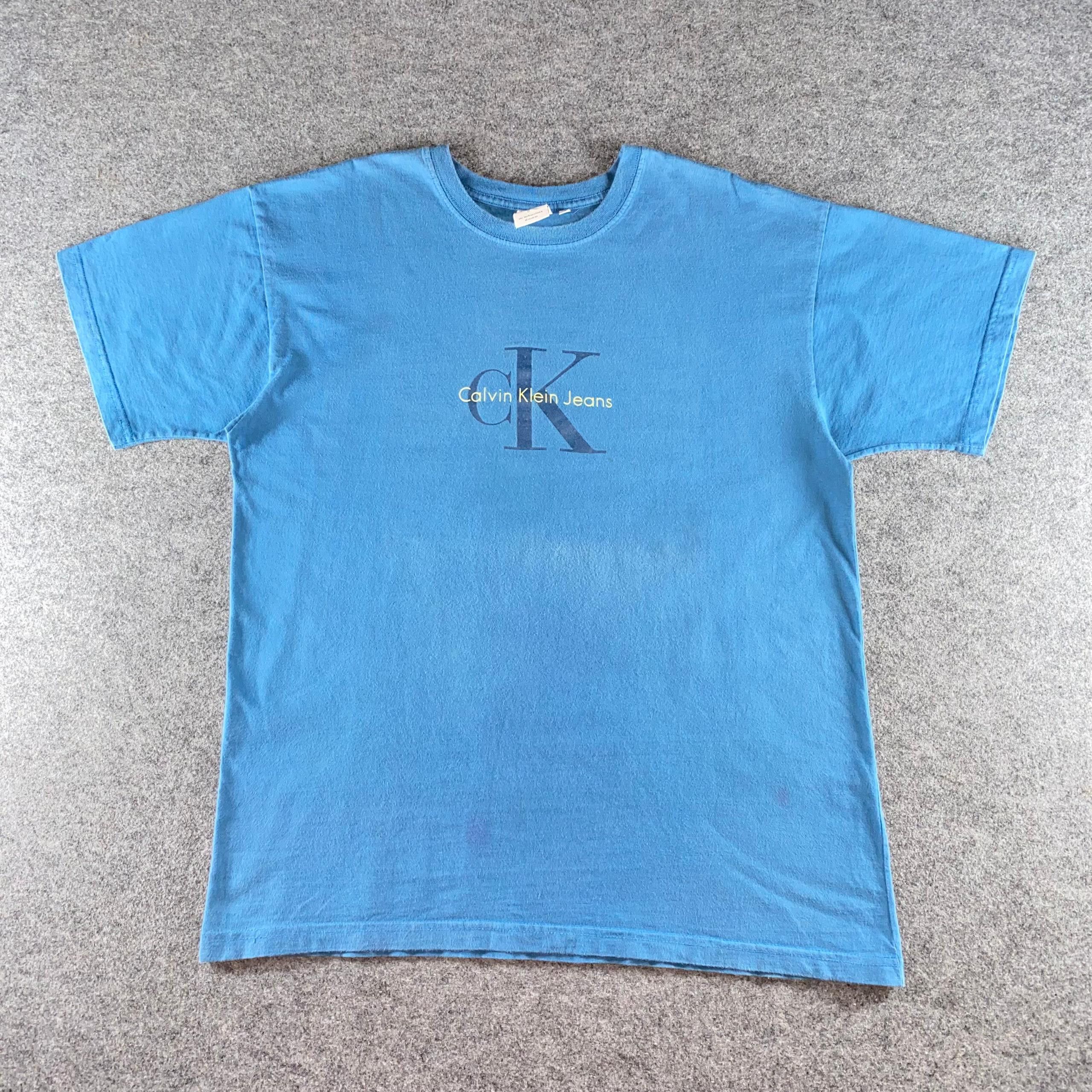 Calvin Klein 205W39NYC Vintage Calvin Klein Spell Out Tshirt Size US L / EU 52-54 / 3 - 1 Thumbnail