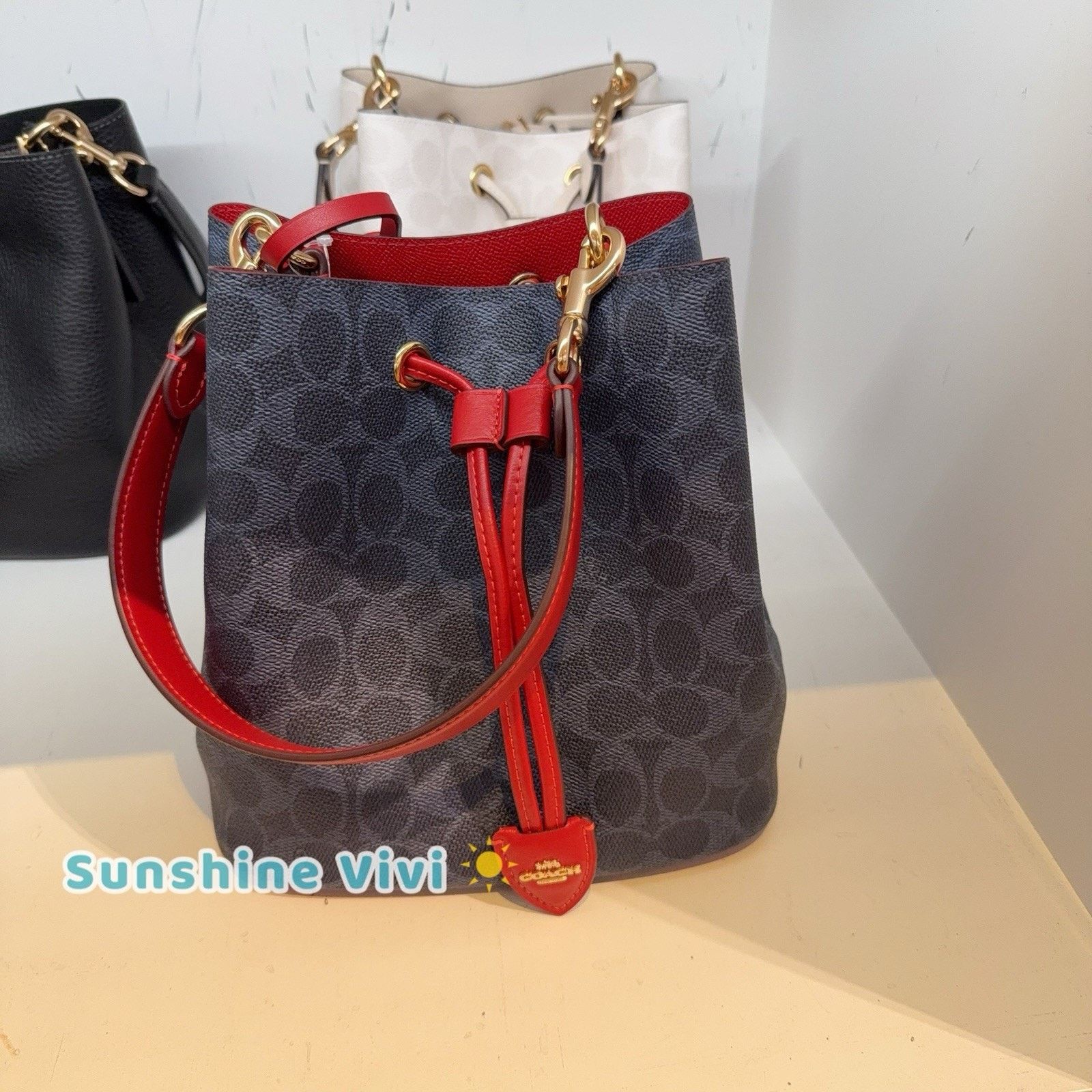 Coach NWT COACH Rowan Bucket Bag CBH07 Denim/Bold Red Crossbody Size ONE SIZE - 1 Thumbnail