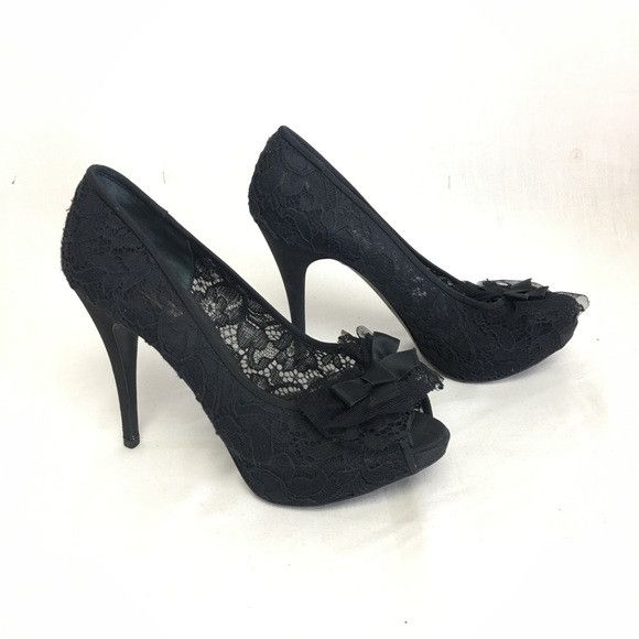 o1mj1ld1sgn0324 Heels in Black