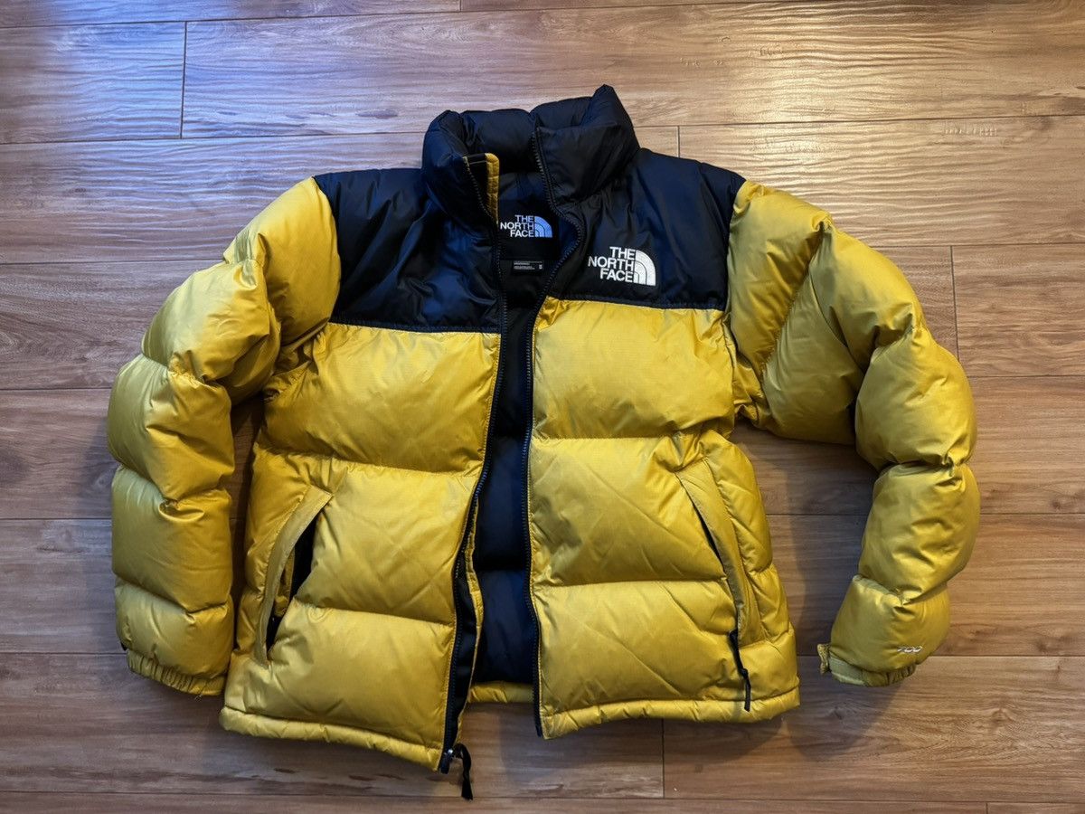 Yellow north face nuptse puffer