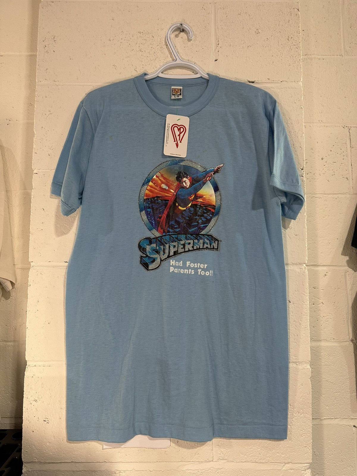 image of Dc Comics x Movie Vintage 70’S Super Man “Had Foster Parents Too” Tee in Blue, Men's (Size XL)