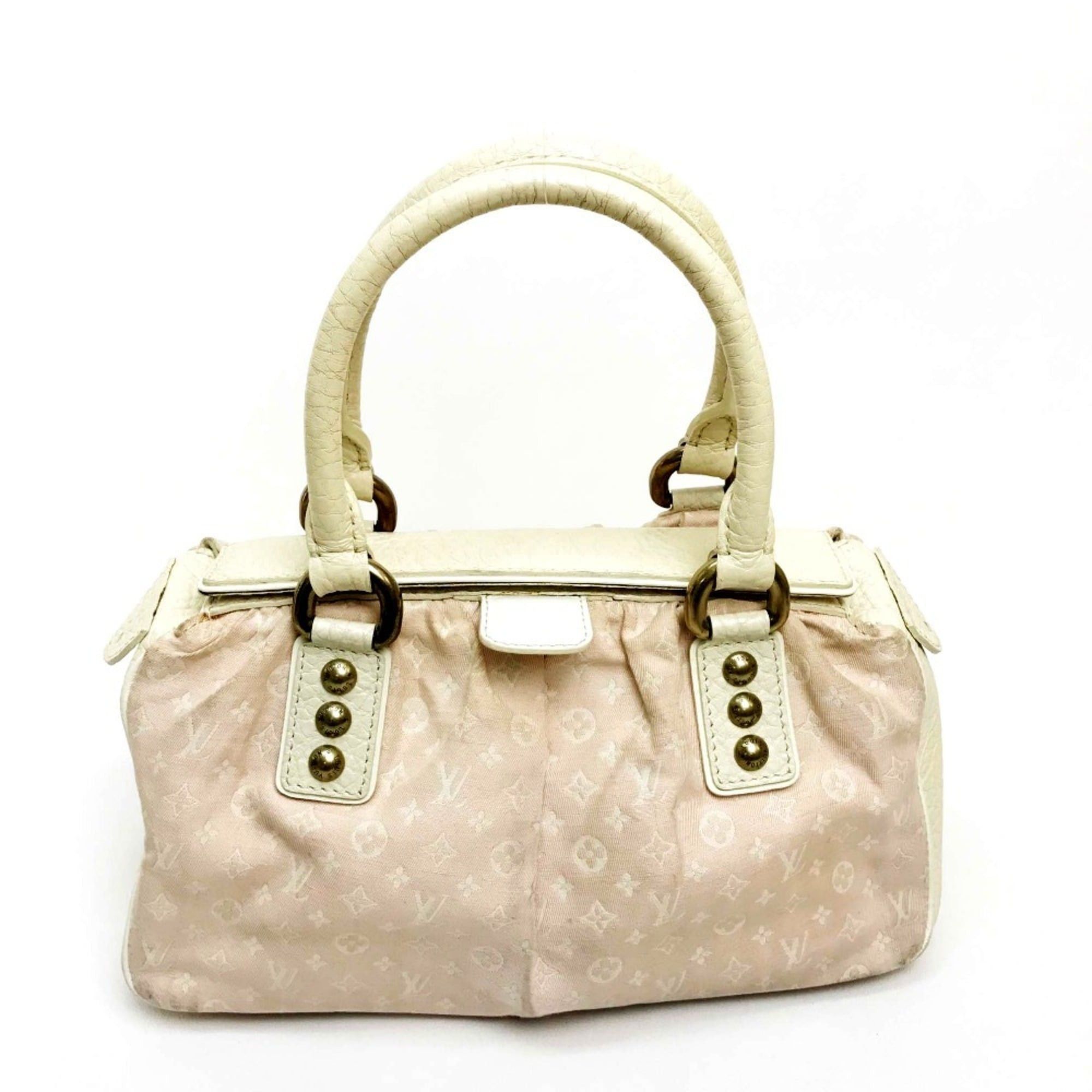 LOUIS VUITTON M40062 Monogram Mini Lantern Trapeze PM Bag from the 2006 Cruise Collection. Cotton linen and leather handbag in rose pink.