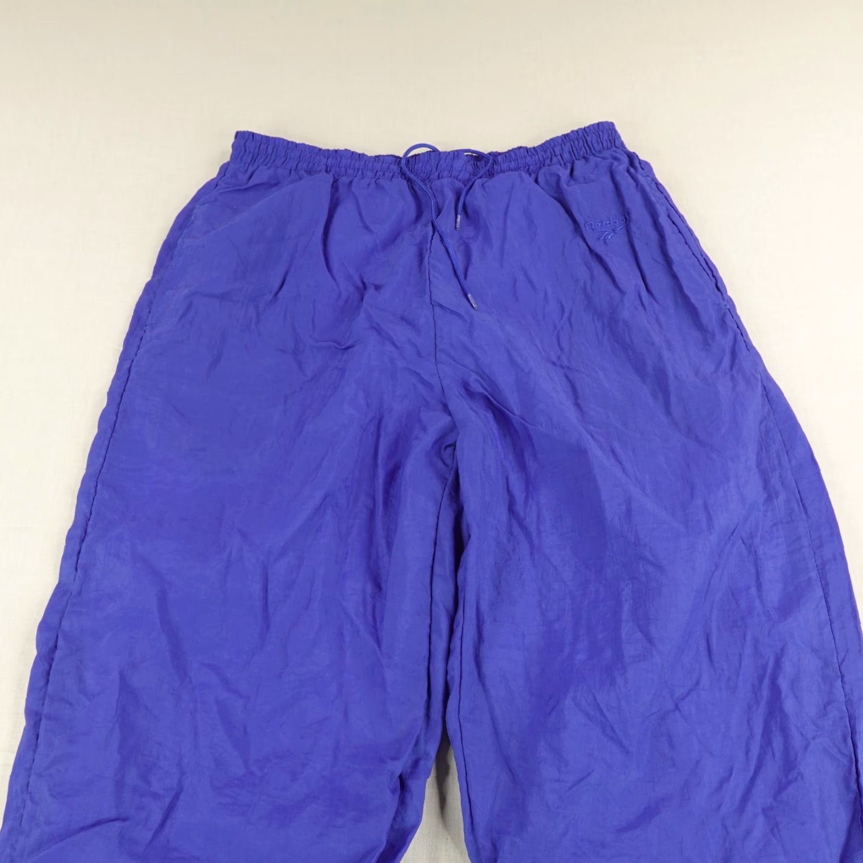 Reebok Vintage Reebok Pants Large Blue Windbreaker Track Pants Ankle Zip Lined 90s joggers ensemble? Size US 31 - 2 Thumbnail