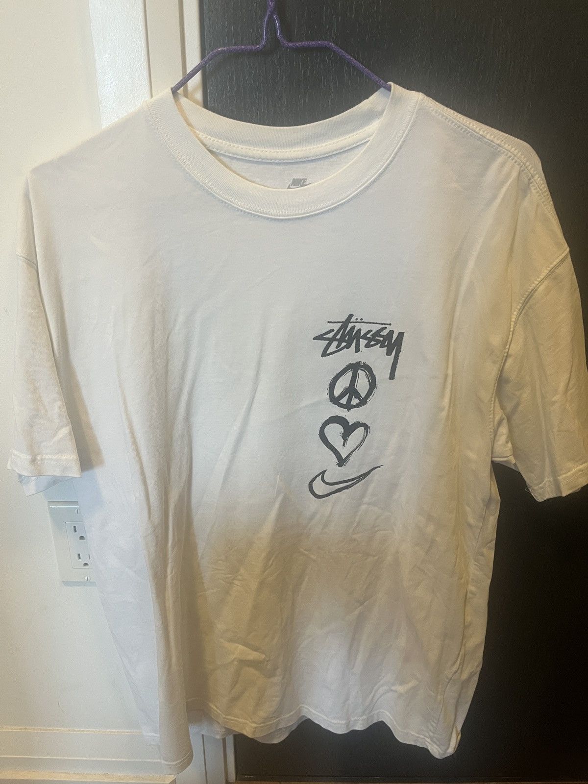 image of Nike X Stüssy Peace, Love, Swoosh in Black, Men's (Size Large)