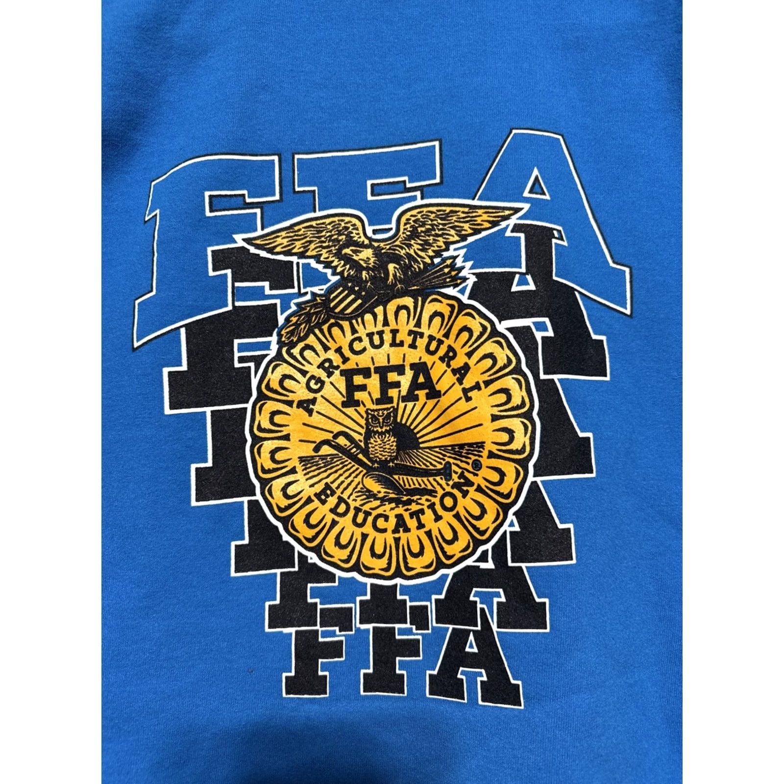 Gildan 2. It leverages key words (Gildan, FFA Agri Ed., Alma, MI, Crewneck, Sweatshirt, Blue, Small) Size US S / EU 44-46 / 1 - 4 Thumbnail