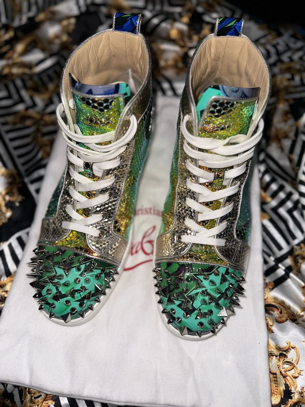 Christian Louboutin Holographic Christian Louboutin pik pik high tops Grailed