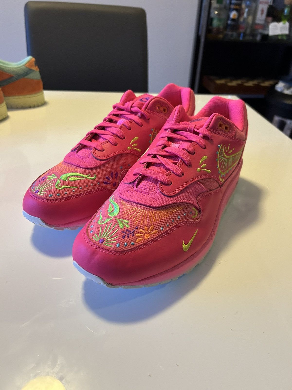 image of Dia De Los Muertos Prm Nike Air Max 1 Shoes in Pink, Men's (Size 13)