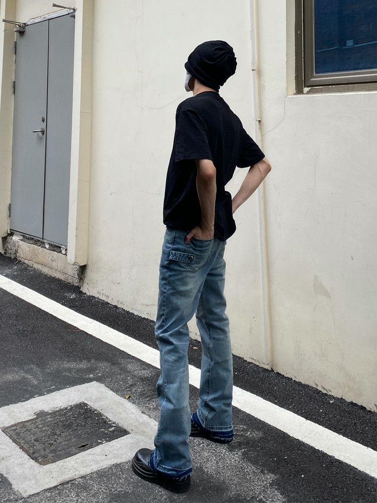 yuppie washed faded damaged flared jeans