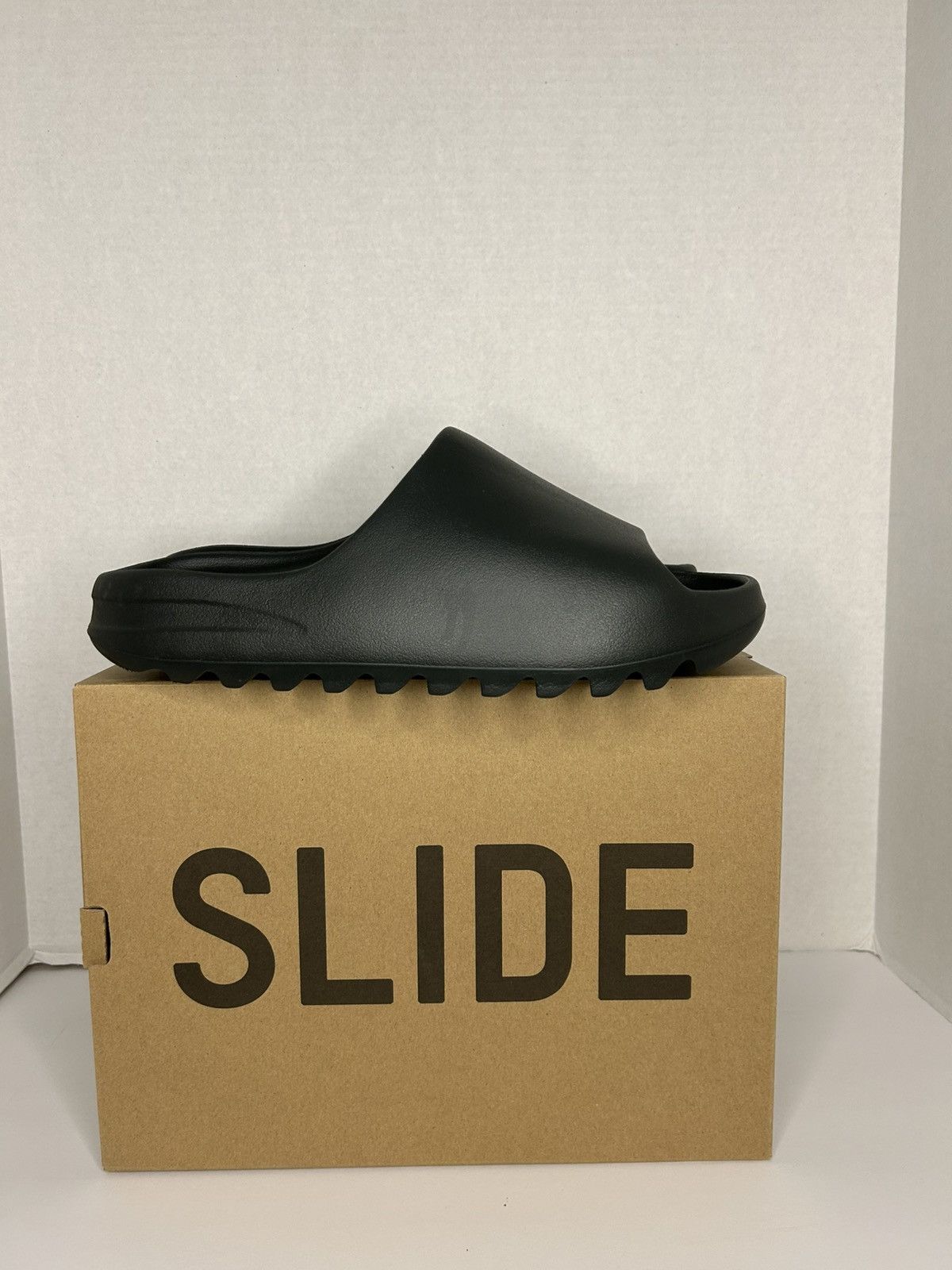 Yeezy Adidas Yeezy Slide Dark Onyx Size US 13 / EU 46 - 1 Thumbnail