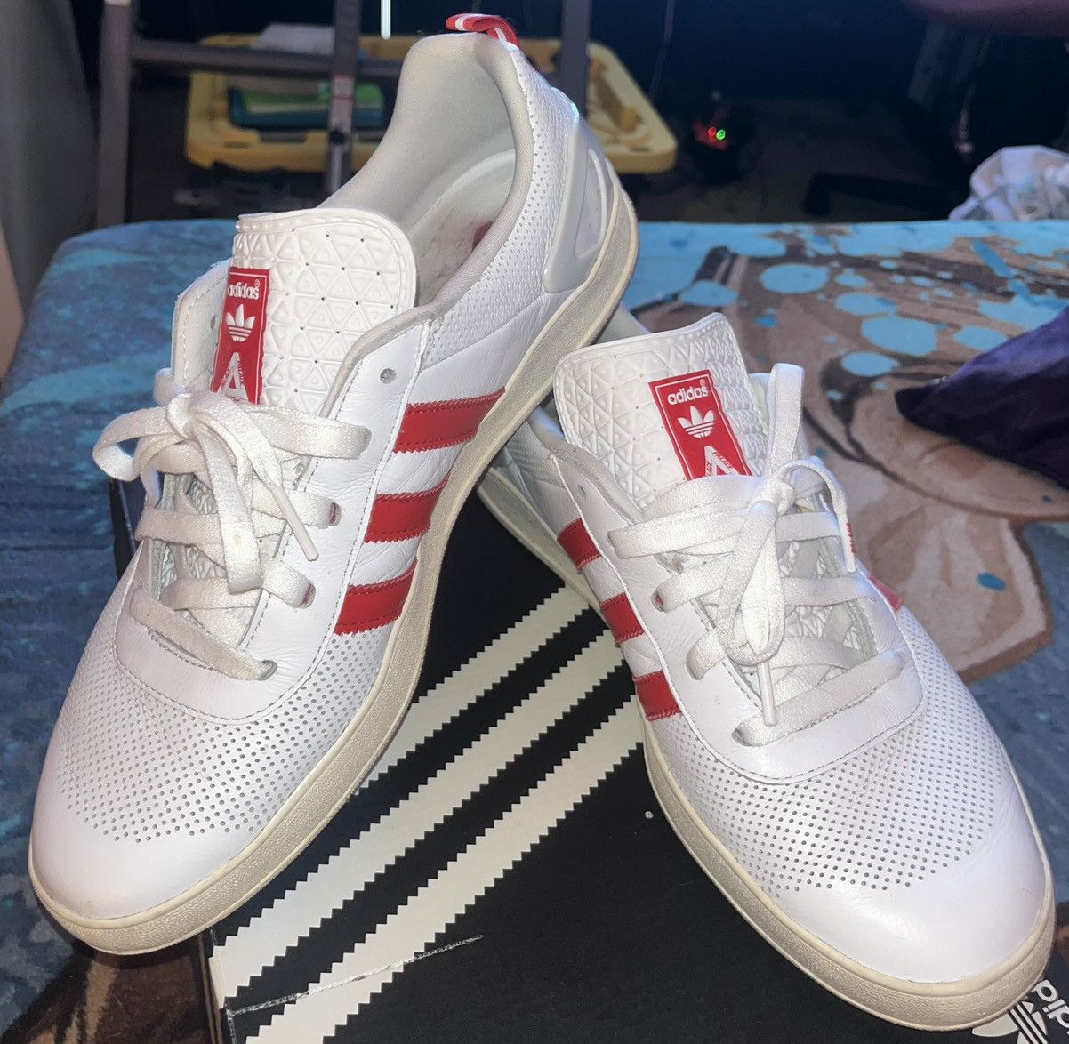 Red-and-white Palace x Adidas sneakers