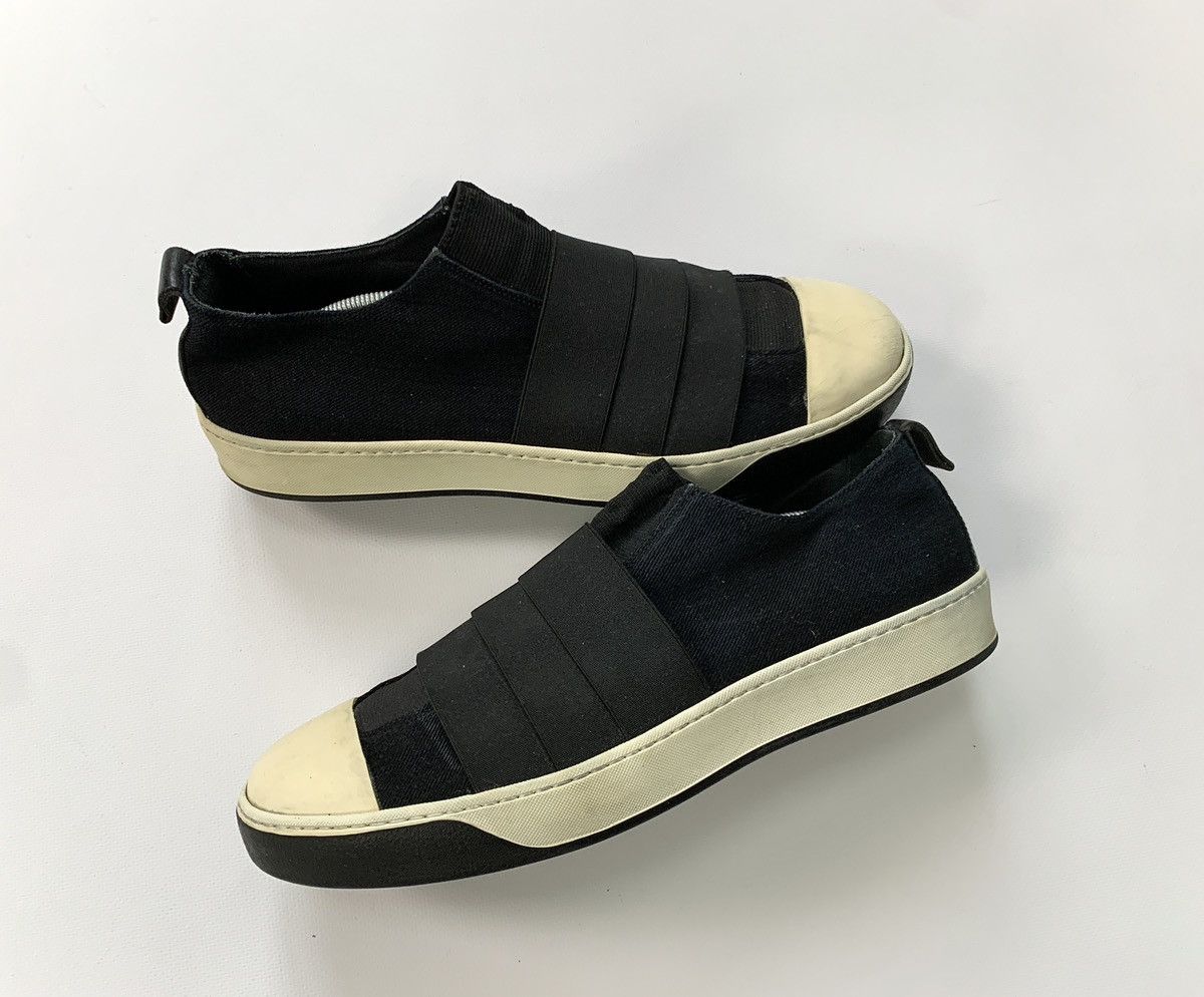image of Avant Garde x Lost Found Ria Dunn Lost & Found Ria Dunn Avantgarde Slip On Sneakers in Black (Size 