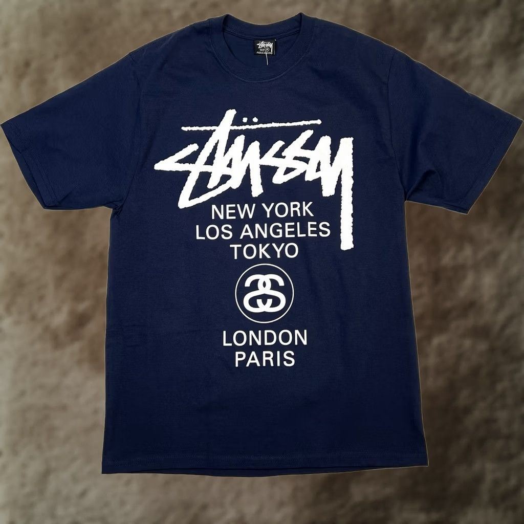Vintage Stussy World Tour Logo Tee Shirt Blue Mens M Short Sleeve Graphic Print T-Shirt 2020s Regular Fit Size US M / EU 48-50 / 2 - 1 Thumbnail