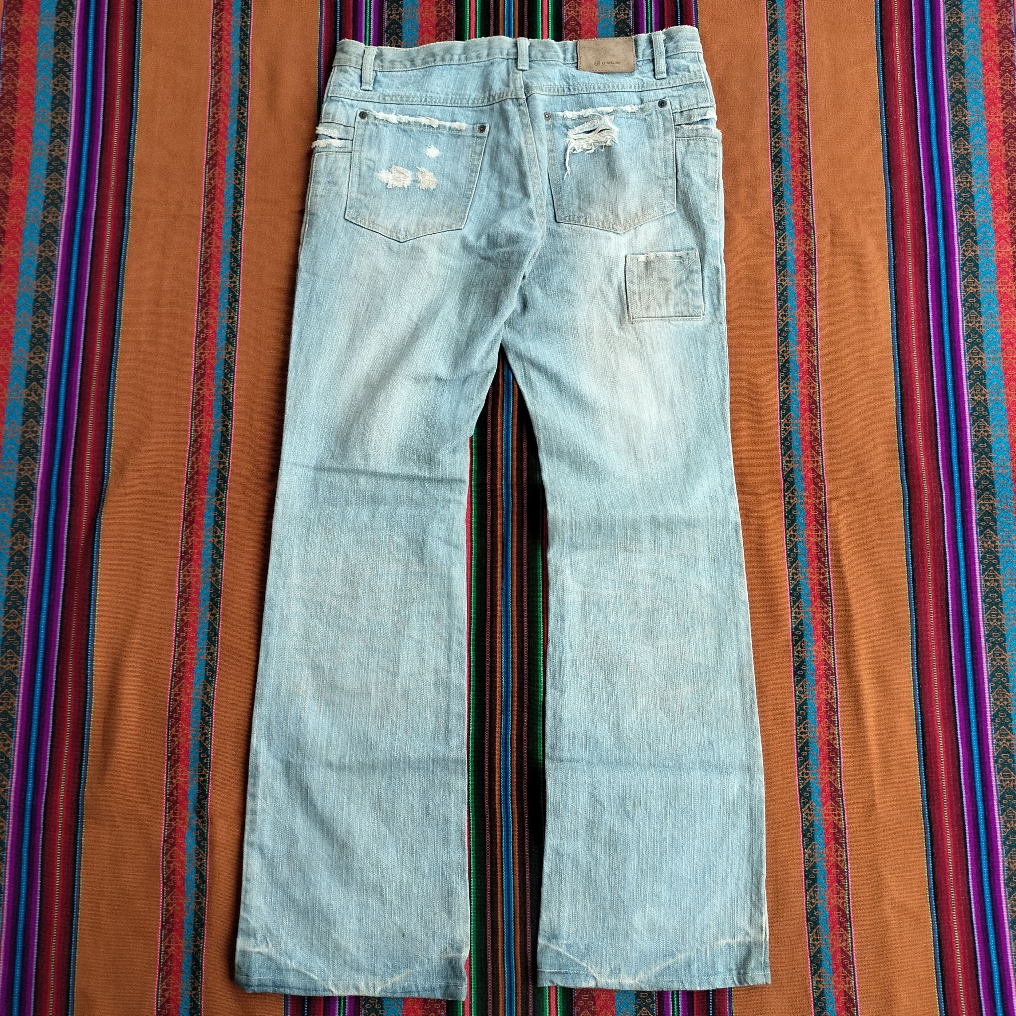 Le Grande Bleu (L.G.B.) mud wash distressed flare denim Size US 34 / EU 50 - 2 Thumbnail